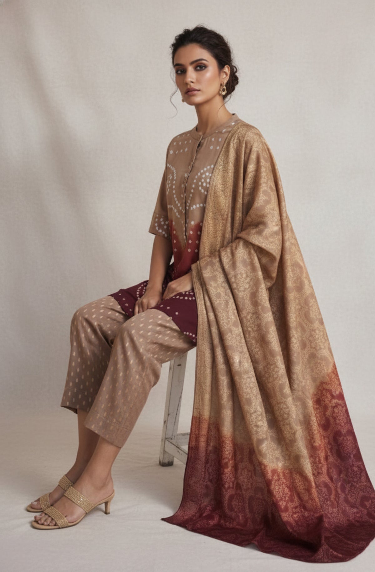Hand tie dyed Bandhani cotton satin shirt in beige with rust and maroon detailing paired with jacquard pants and Banarasi weave dupatta