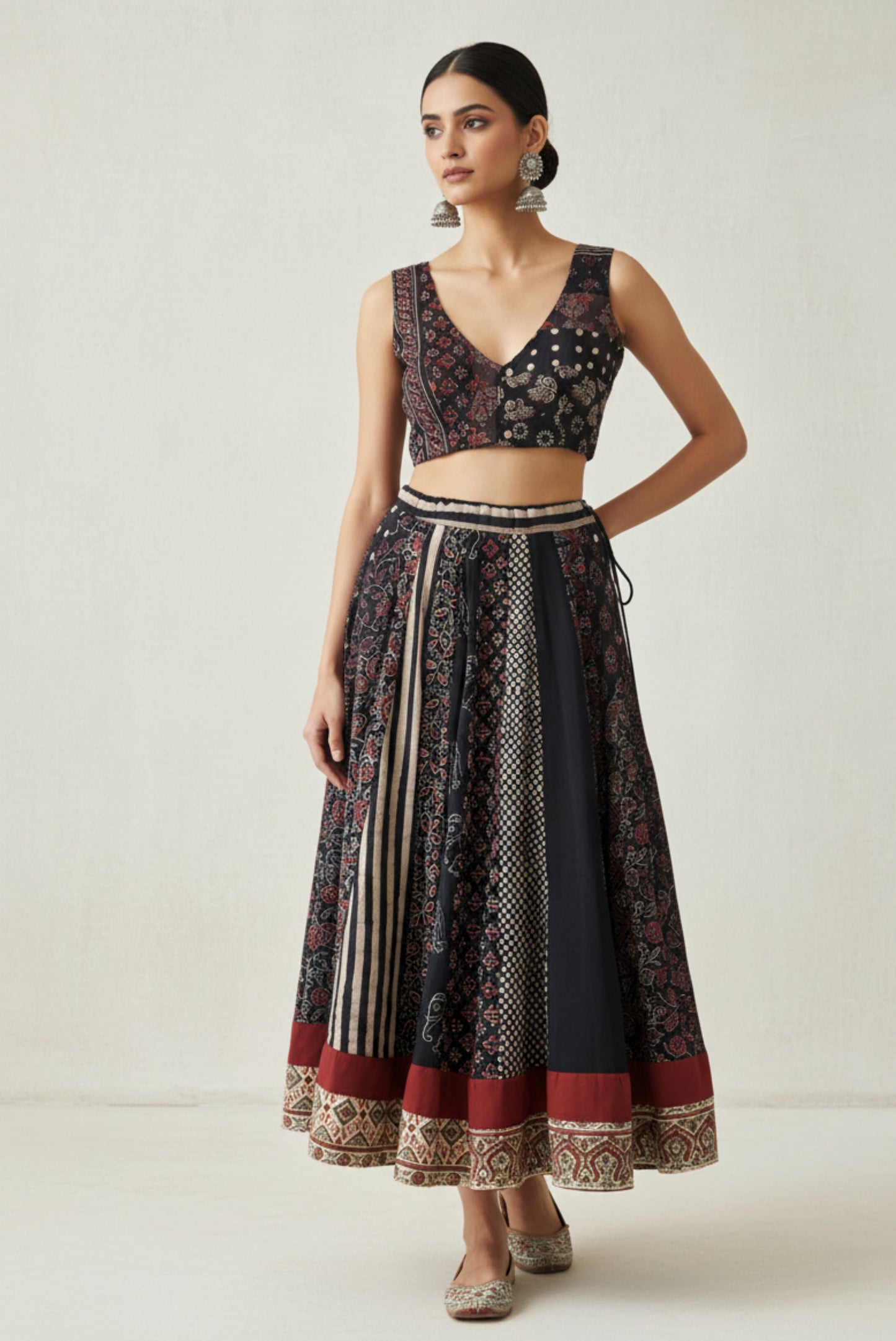 Black natural dyed Ajrakh hand block printed skirt and blouse set with flared kali skirt, multi Ajrakh panels, lined padded blouse and handcrafted details