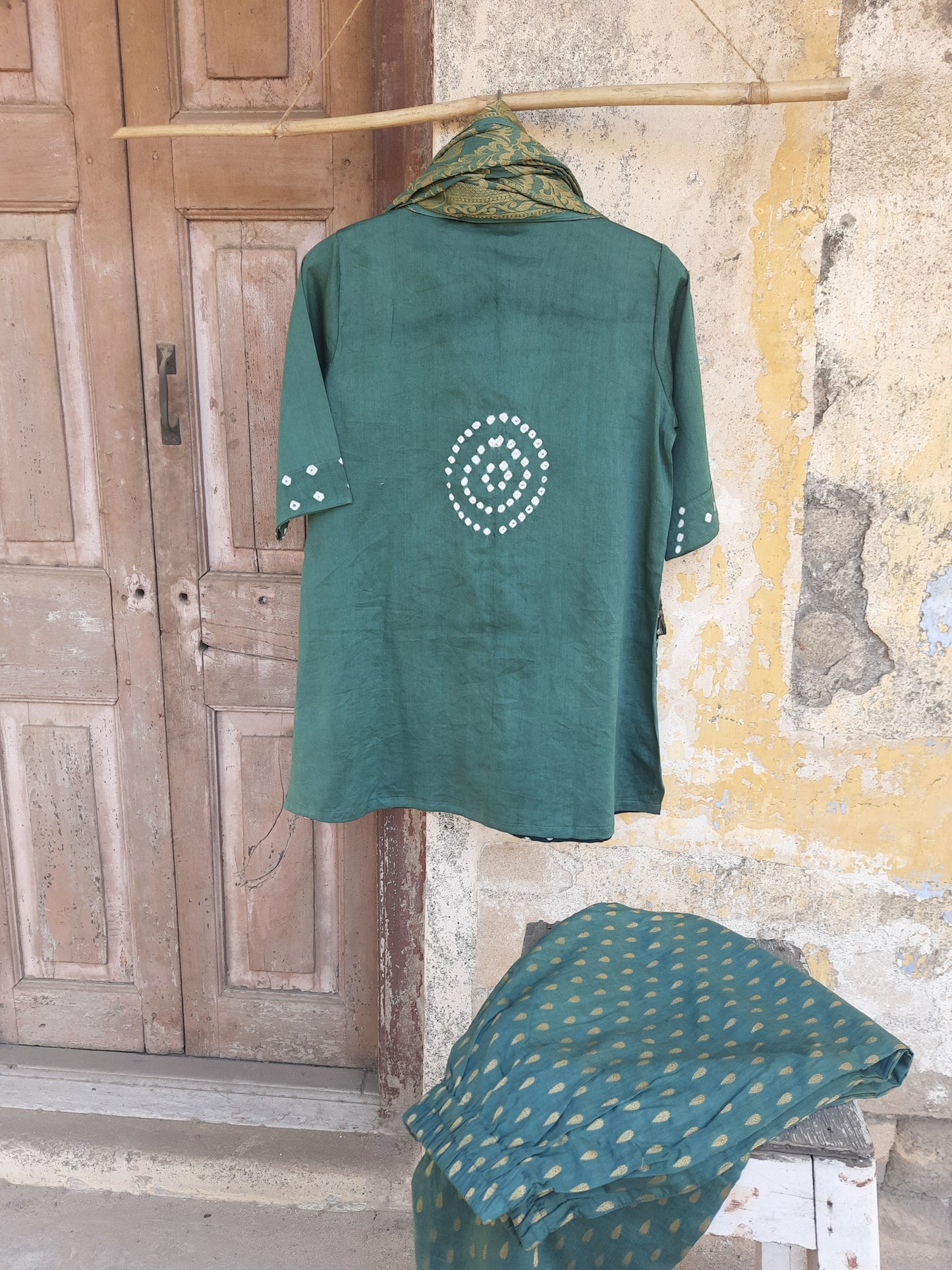 Hand tie dyed Bandhani shirt pant coord set in deep olive green cotton satin with mandarin collar, elasticated pants and Banarasi weave dupatta