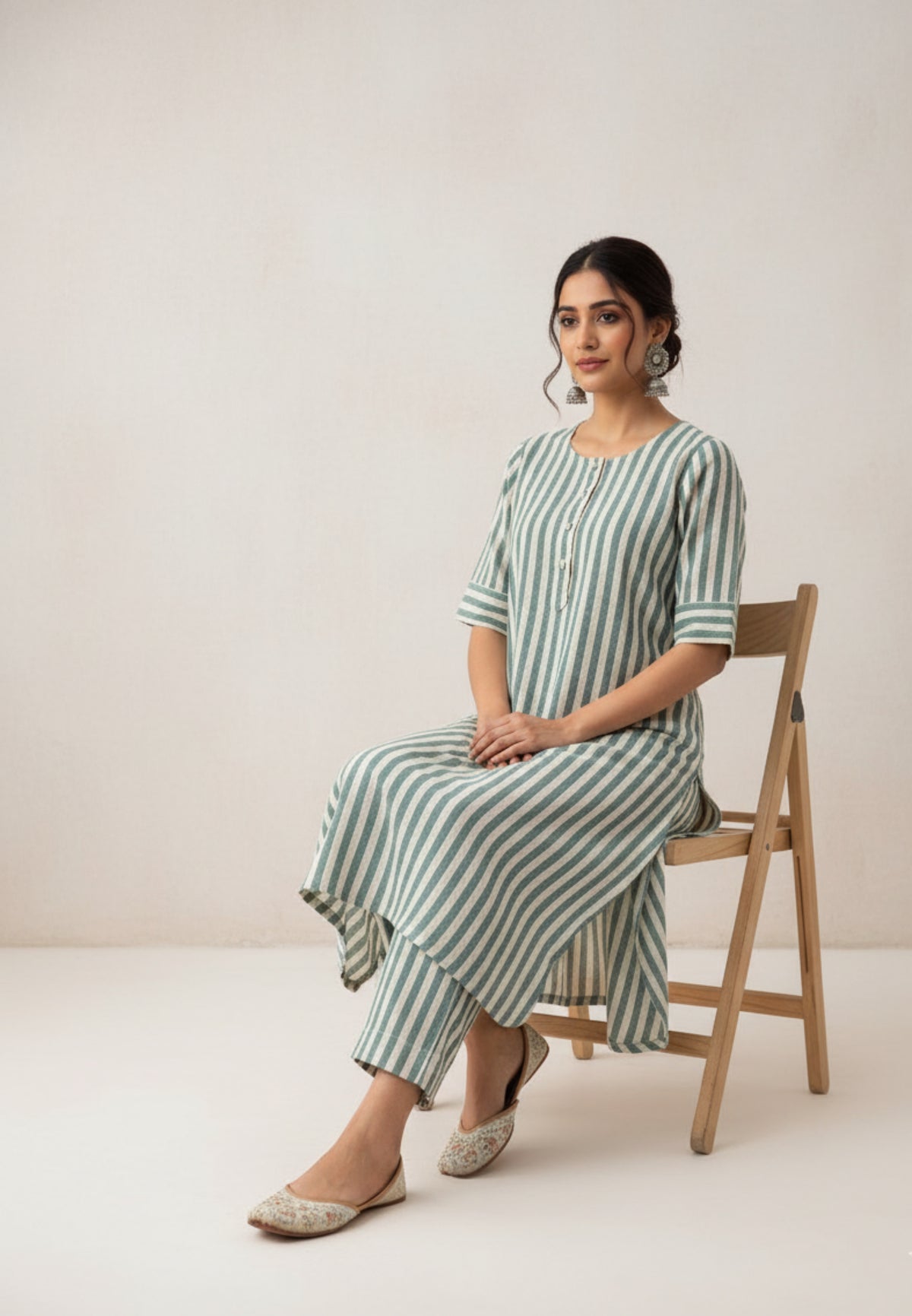 Handwoven organic cotton green and off-white striped co-ord set with round-neck kurta and elasticated waist pants, handmade by artisans, breathable and comfortable sustainable clothing from Turquoisethestore.