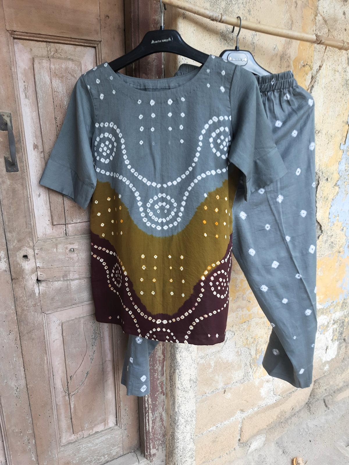 Hand tie-dyed Bandhani three-piece co-ord set in grey, olive and maroon with cotton satin top, elastic pants and cotton dupatta.