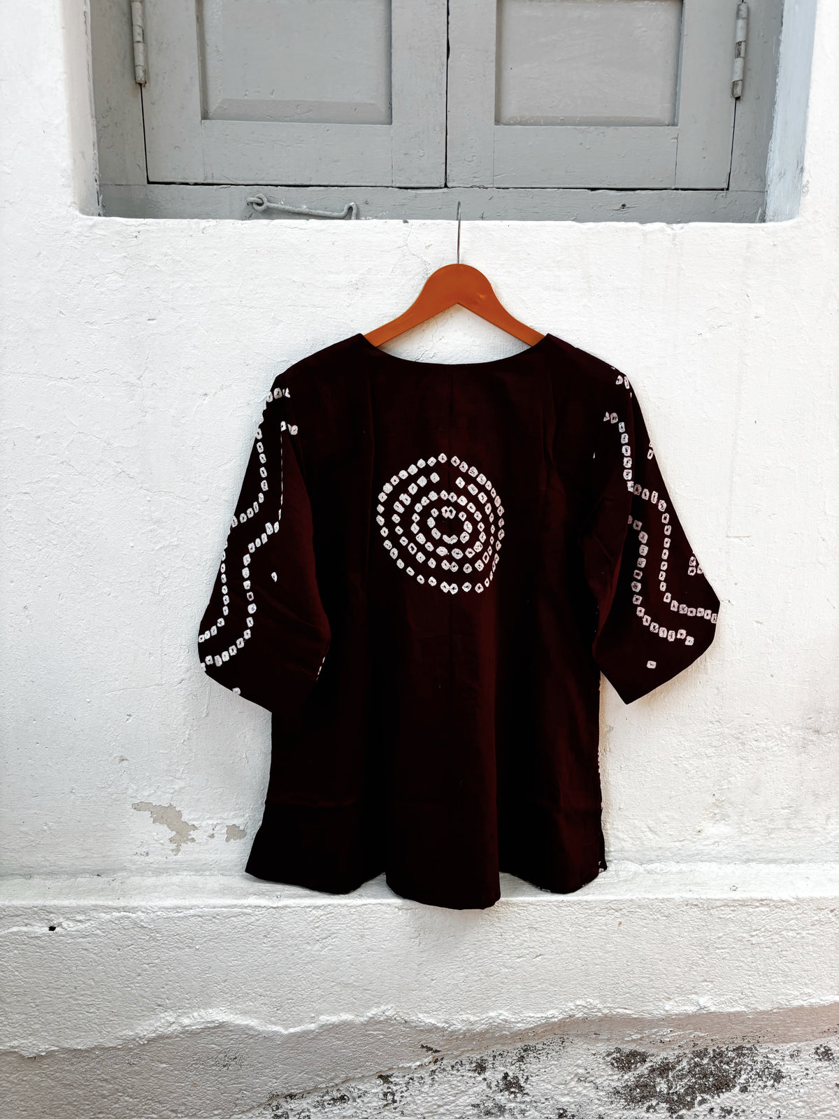Madhur deep wine-plum cotton satin shirt with hand tie-dyed ivory Bandhani geometric patterns and round neckline.