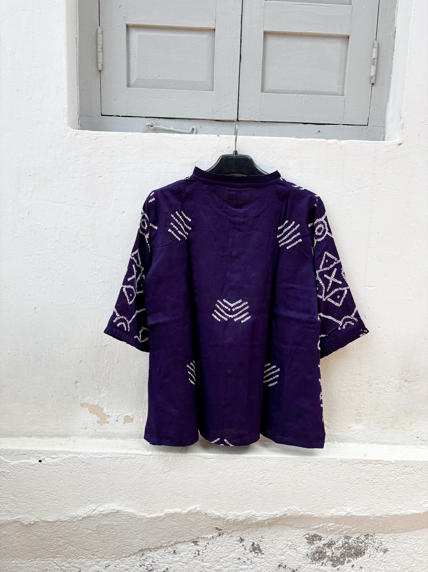Banafsha festive Rai Bandhani cotton shirt in deep plum purple with ivory hand tie-dyed Bandhani, pleated neckline and three-quarter sleeves