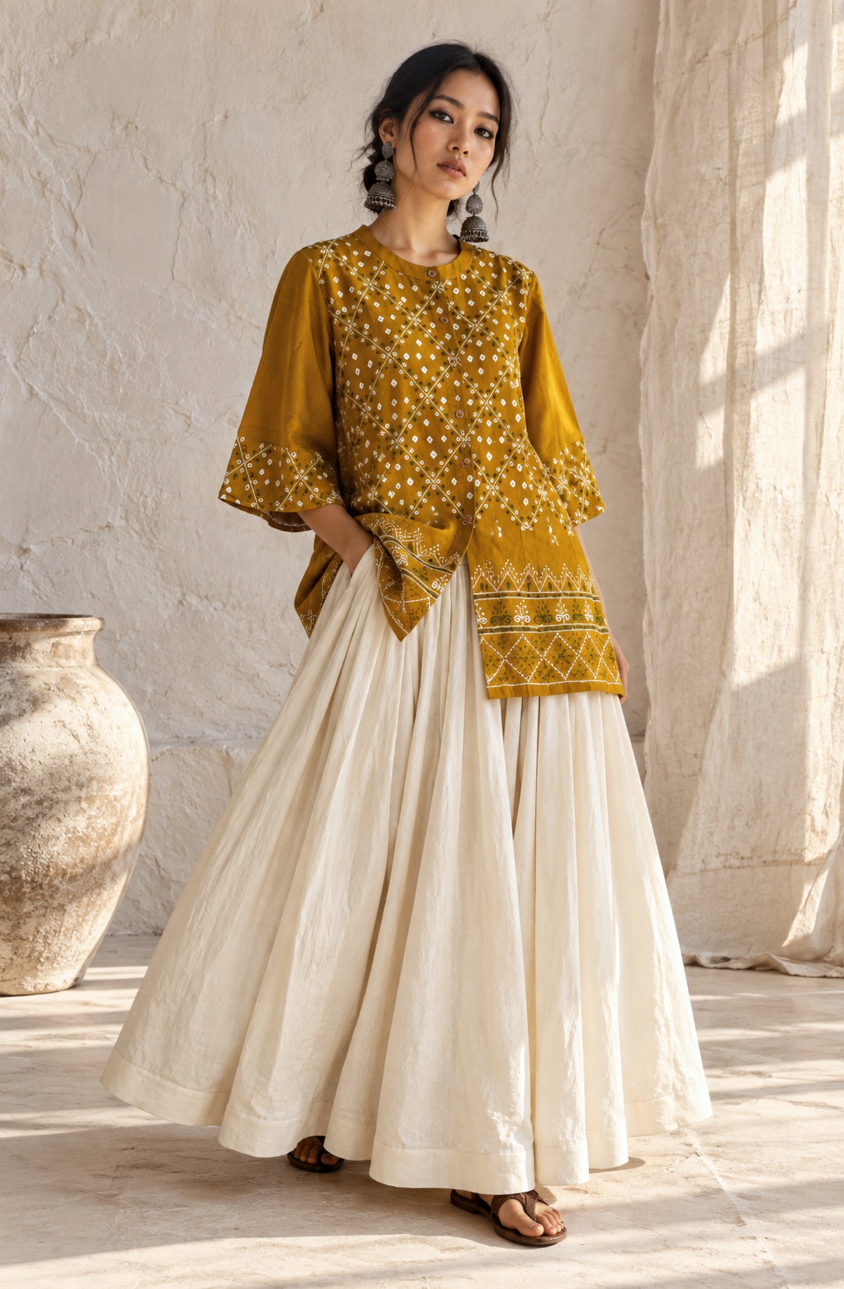 Dhoop mustard-gold hand tie-dyed Bandhani cotton satin shirt with geometric machine embroidery