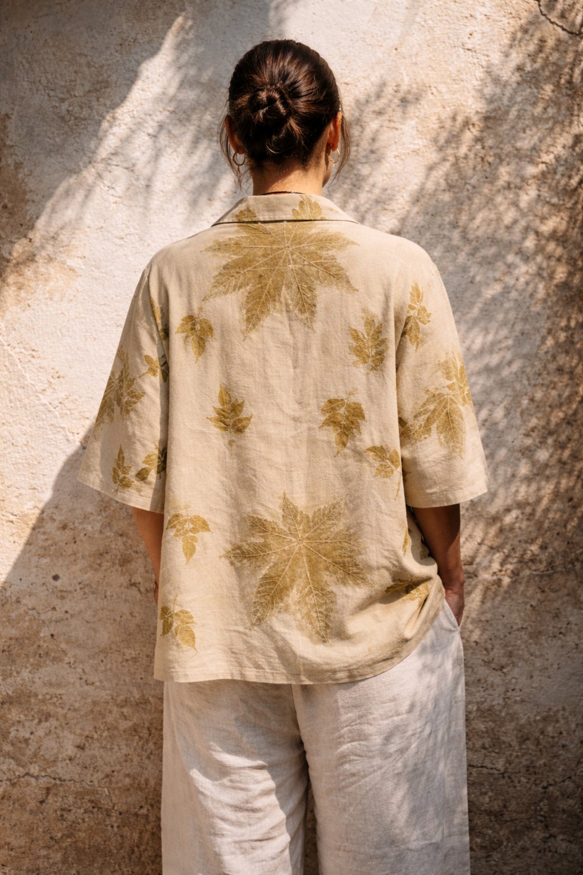 Handspun handwoven cotton eco print shirt for women in sand beige with natural leaf prints in olive tones, relaxed fit, handmade and naturally dyed.