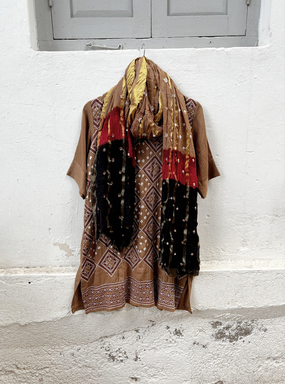 Kasturi three-piece brown Bandhani coord set with embroidered kurta, matching pants and tricolour dupatta