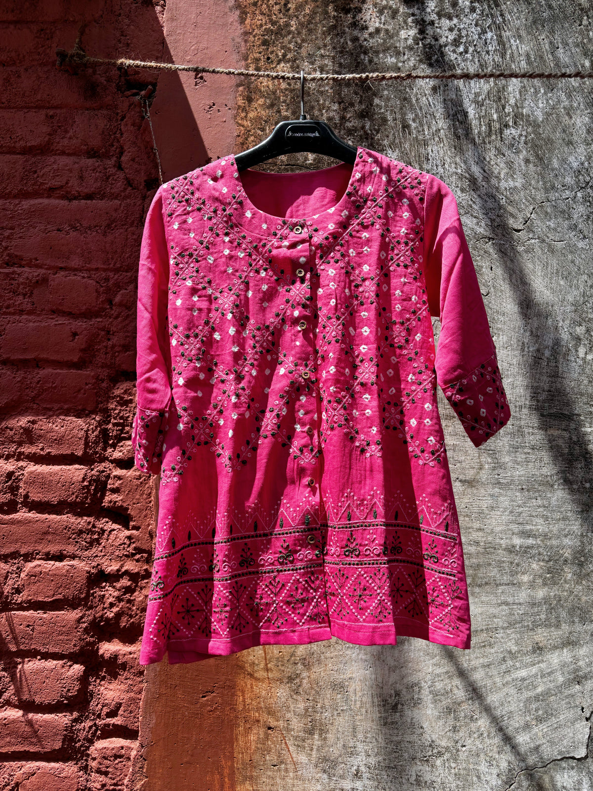 Pankhudi Gulabi pink hand tie-dyed Bandhani cotton satin shirt with machine embroidery and traditional Indian textile detailing