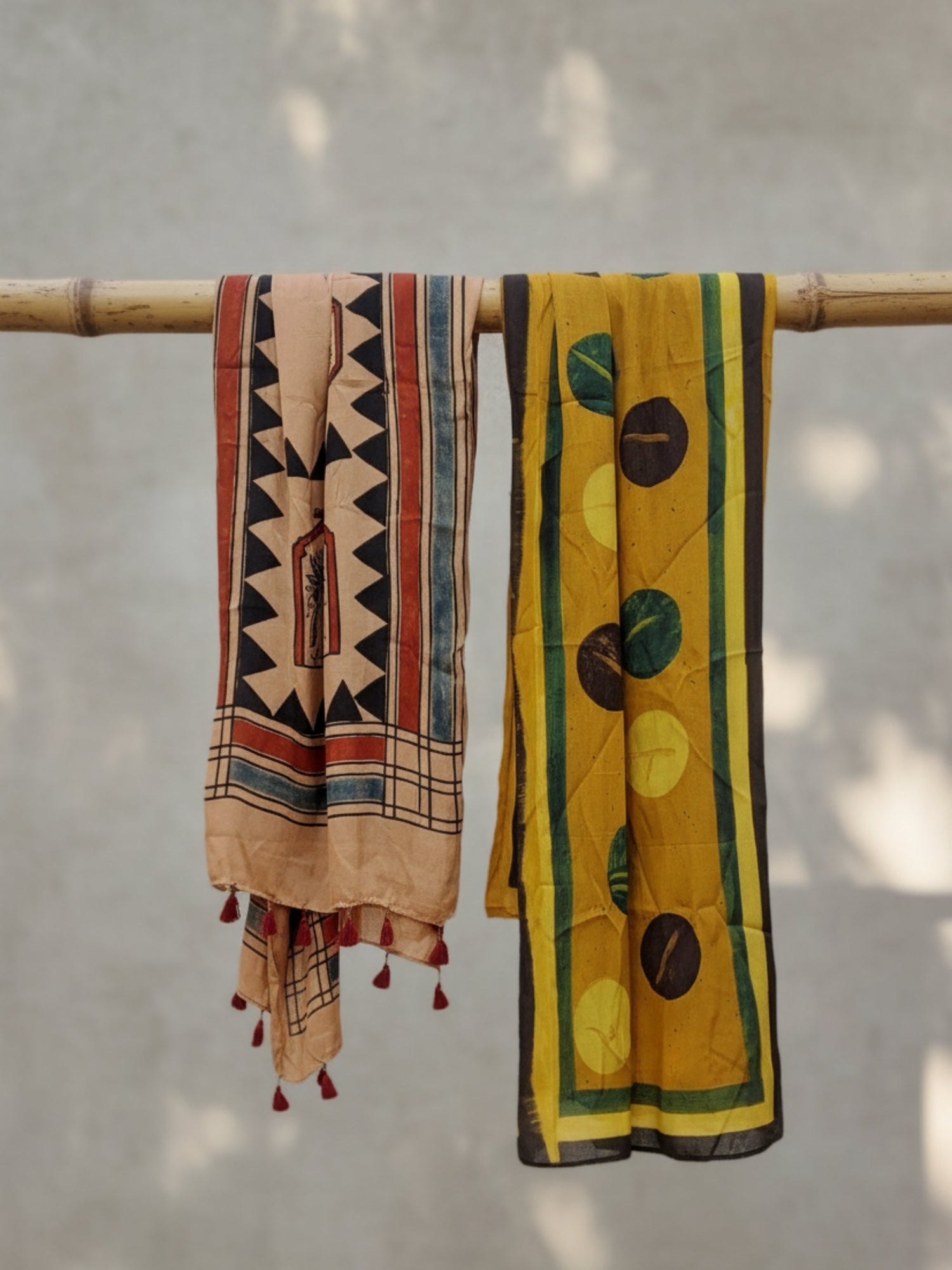 Handcrafted Ajrakh hand block printed dupattas and stoles in naturally dyed modal silk and organic cotton, featuring traditional motifs, soft drapes, and artisanal detailing.