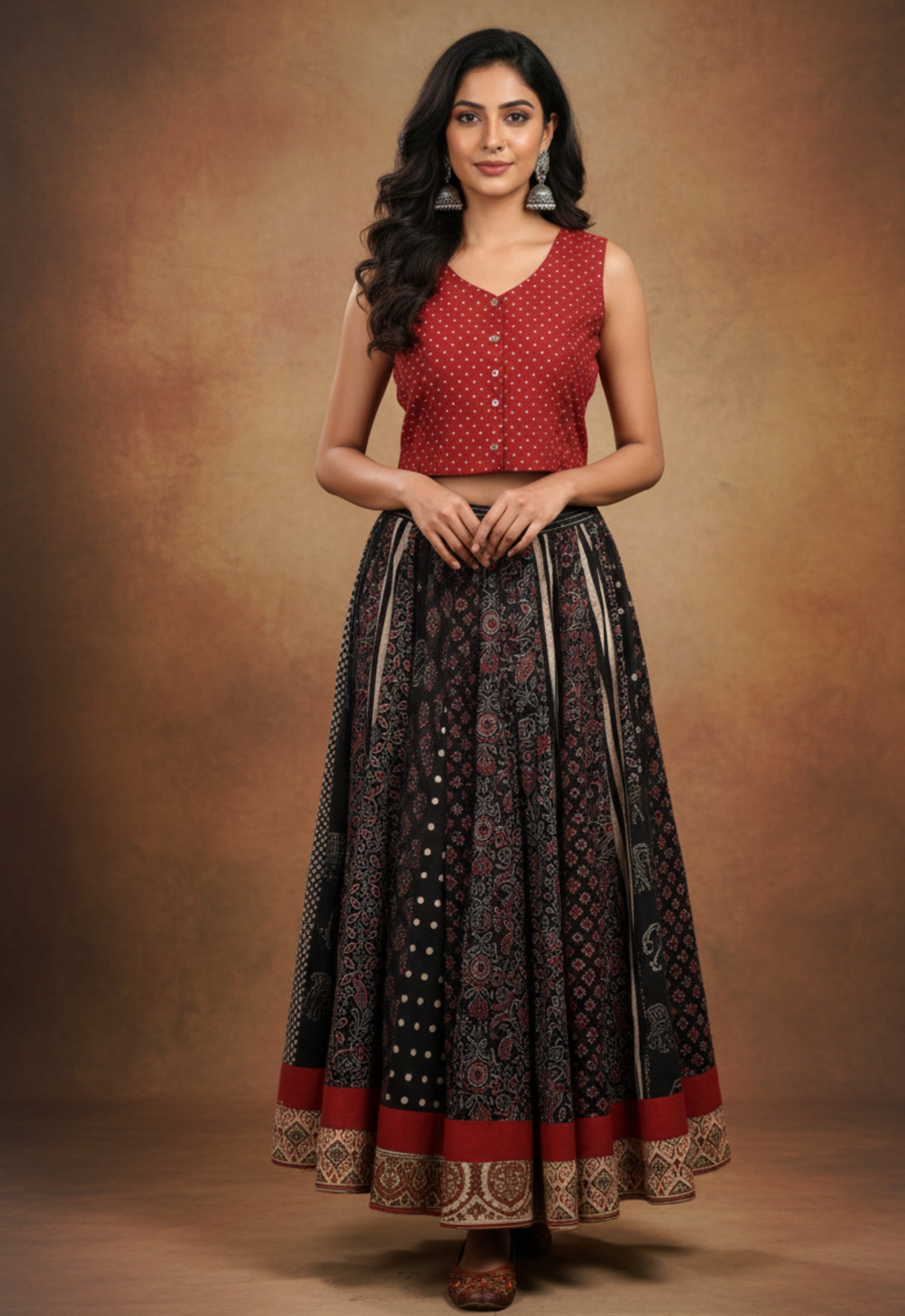 Handcrafted black Ajrakh hand block printed cotton skirt with multi prints and red polka dot sleeveless crop top, naturally dyed and slow-made by Turquoisethestore.