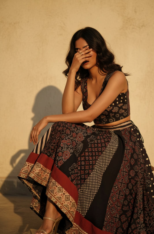 Black natural dyed Ajrakh hand block printed flared kali skirt with multi panel prints, border detailing, lined cotton fabric and drawstring waist