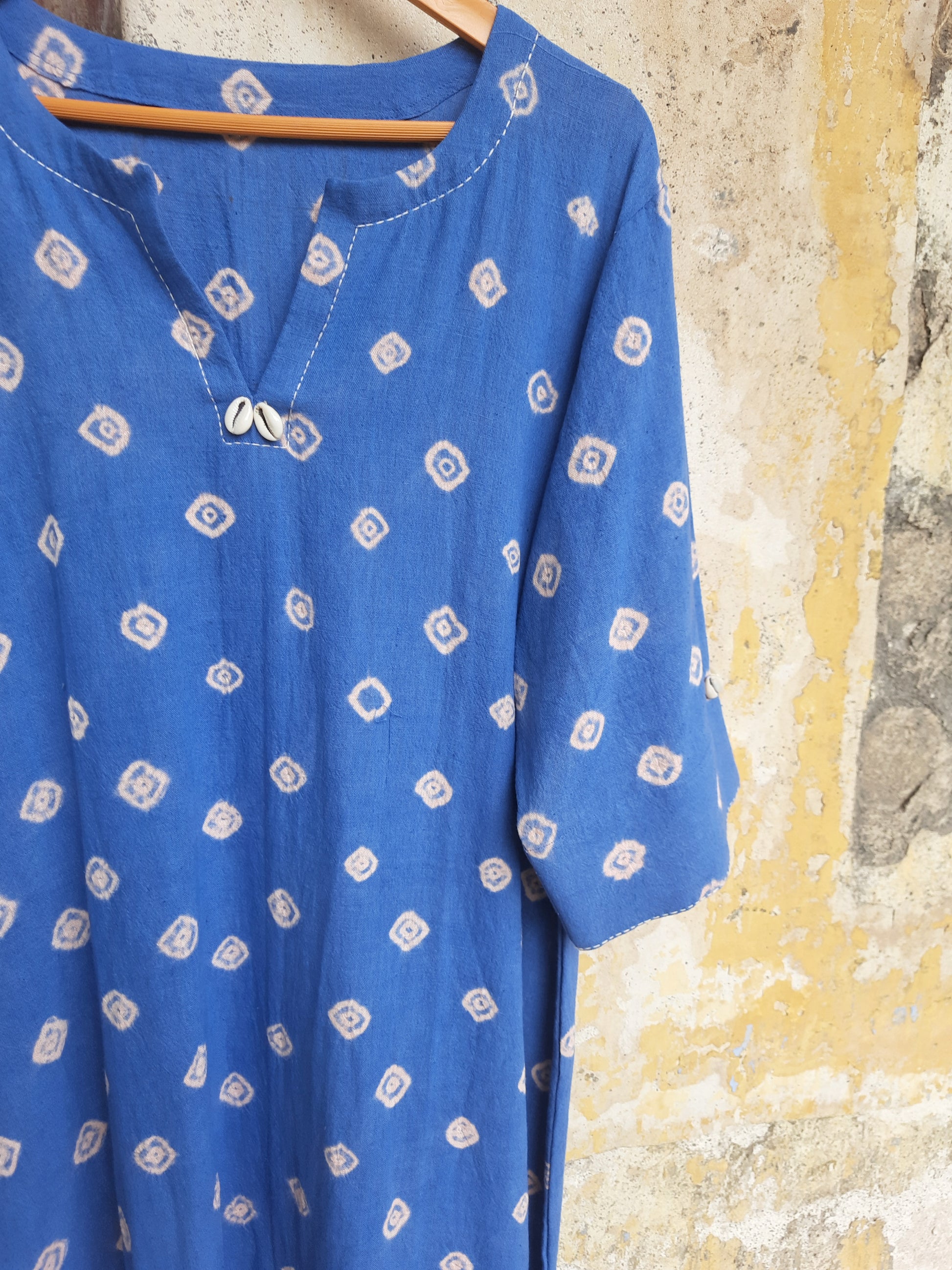 Blue Bandhani handwoven oversized kurta in organic cotton with cowrie and thread detailing by Turquoisethestore.