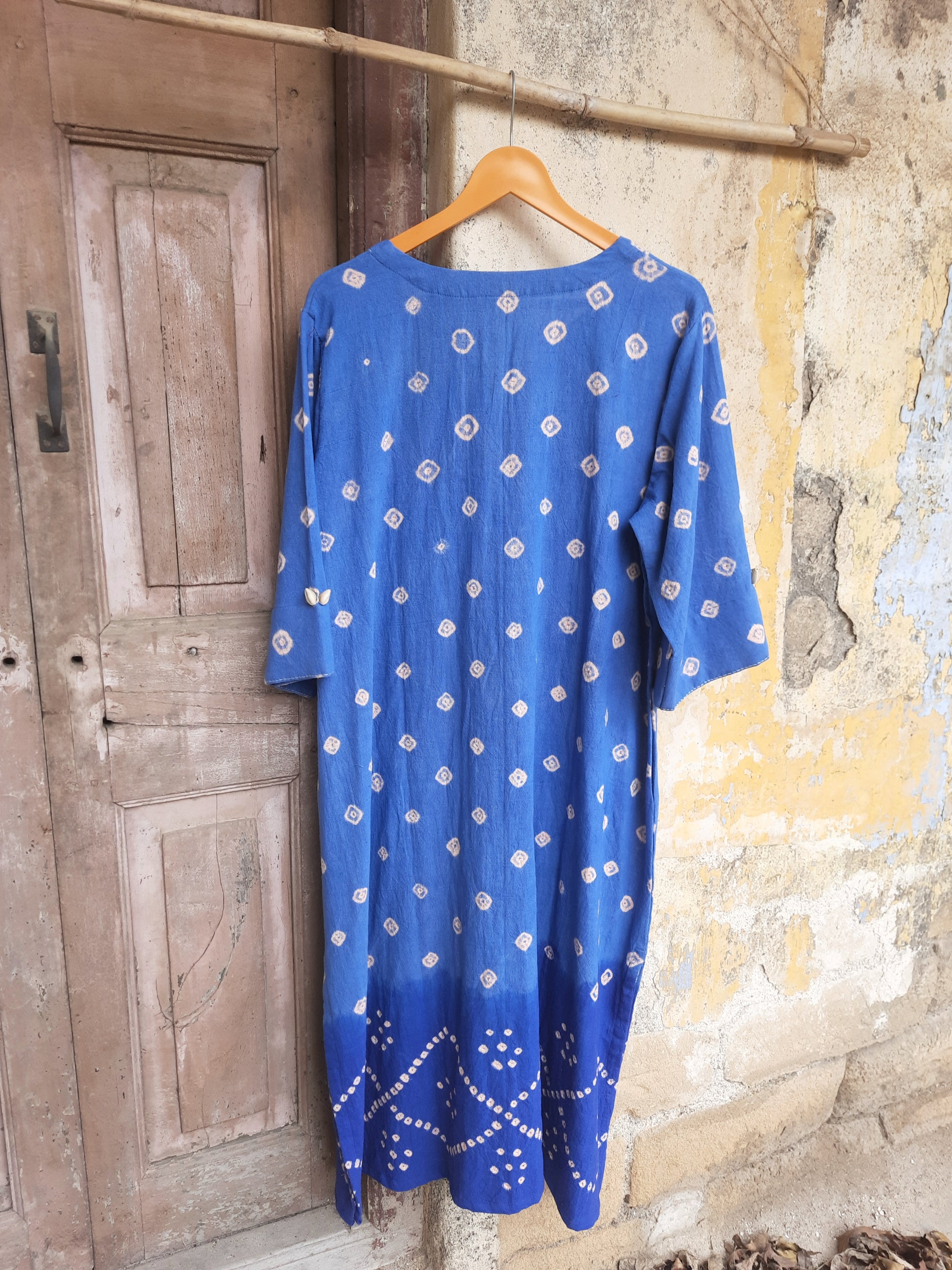 Blue Bandhani handwoven oversized kurta in organic cotton with cowrie and thread detailing by Turquoisethestore.