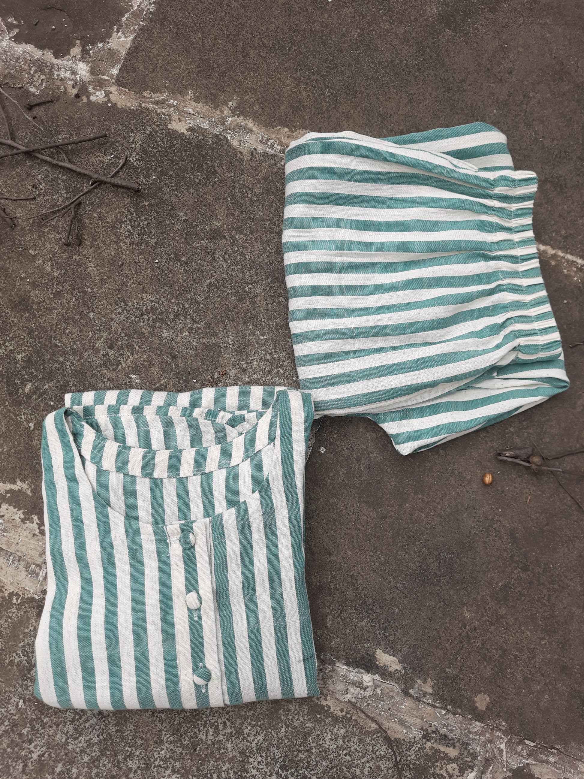 Handwoven organic cotton green and off-white striped co-ord set with round-neck kurta and elasticated waist pants, handmade by artisans, breathable and comfortable sustainable clothing from Turquoisethestore.