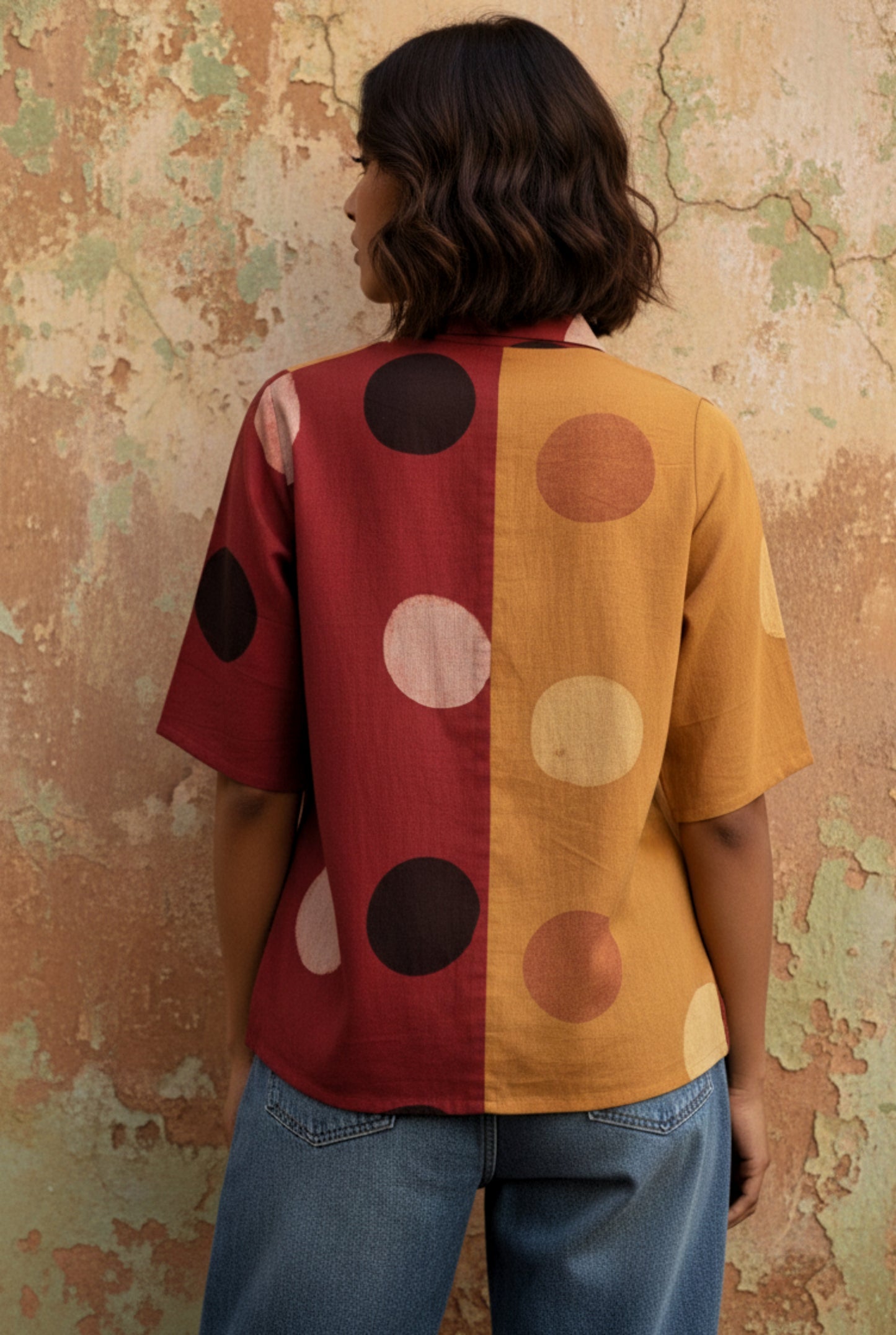 Half and half ajrakh hand block printed cotton shirt with cosmic moon polka motifs in turmeric yellow and madder red