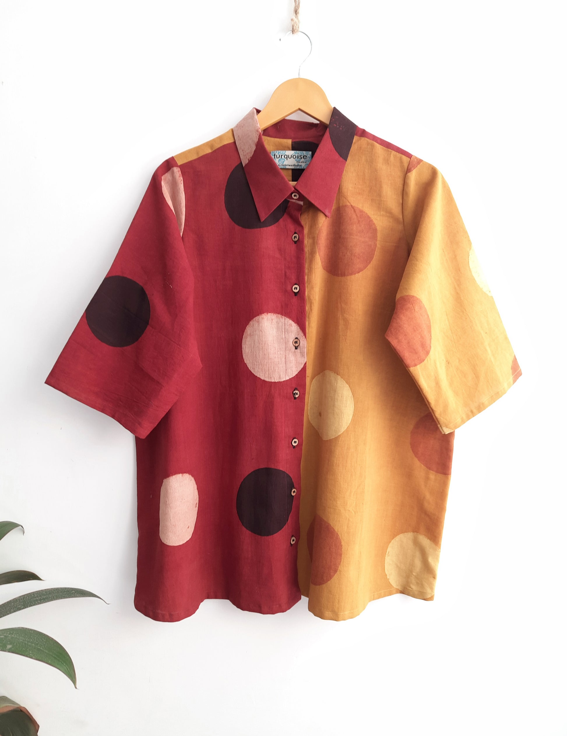 Half and half ajrakh hand block printed cotton shirt with cosmic moon polka motifs in turmeric yellow and madder red