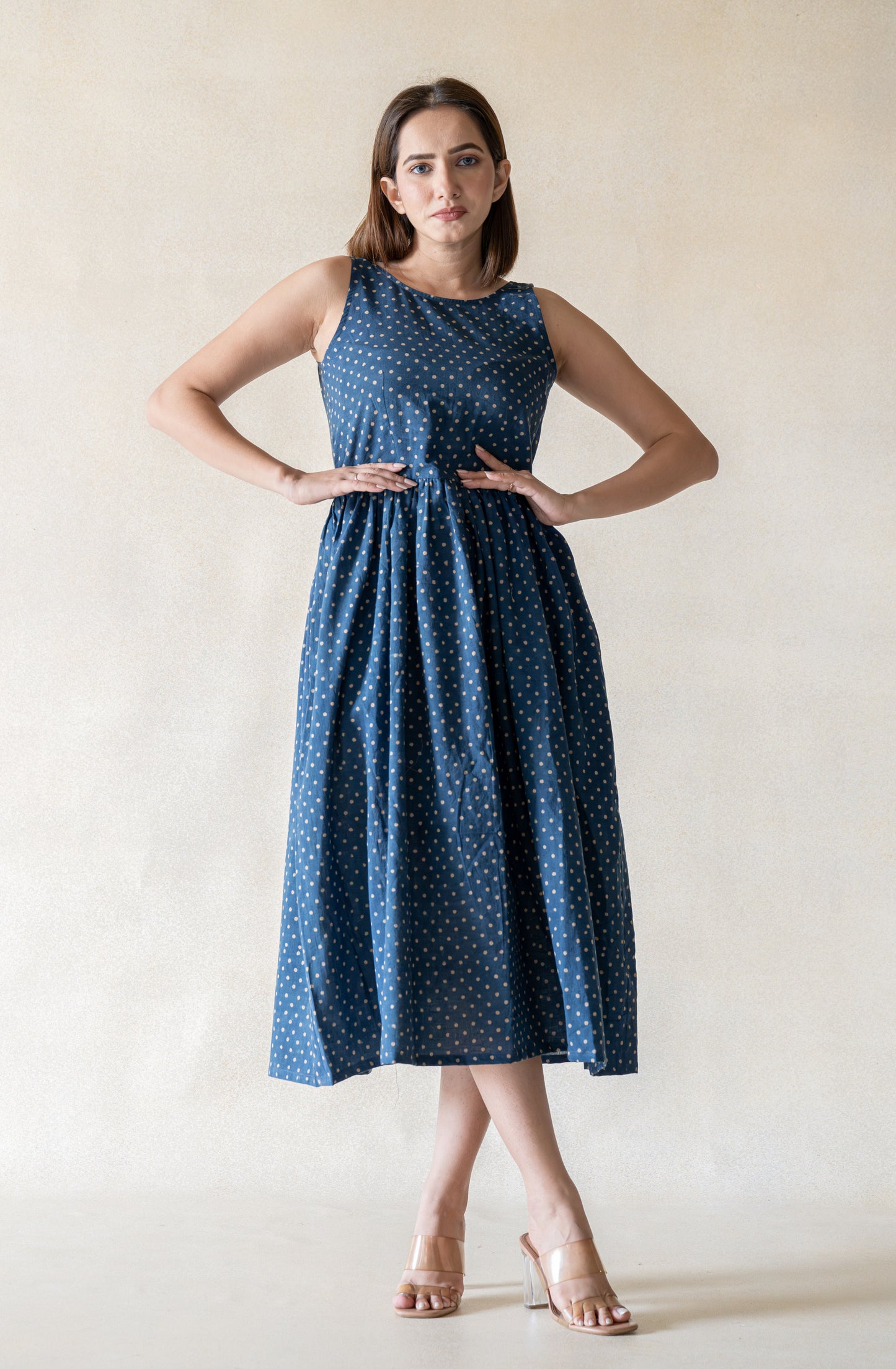 Indigo polka dot cotton dress with a relaxed silhouette and gentle gathers. Easy everyday dress in indigo colour, breathable and lightweight, not lined, designed for comfort and effortless wear.
