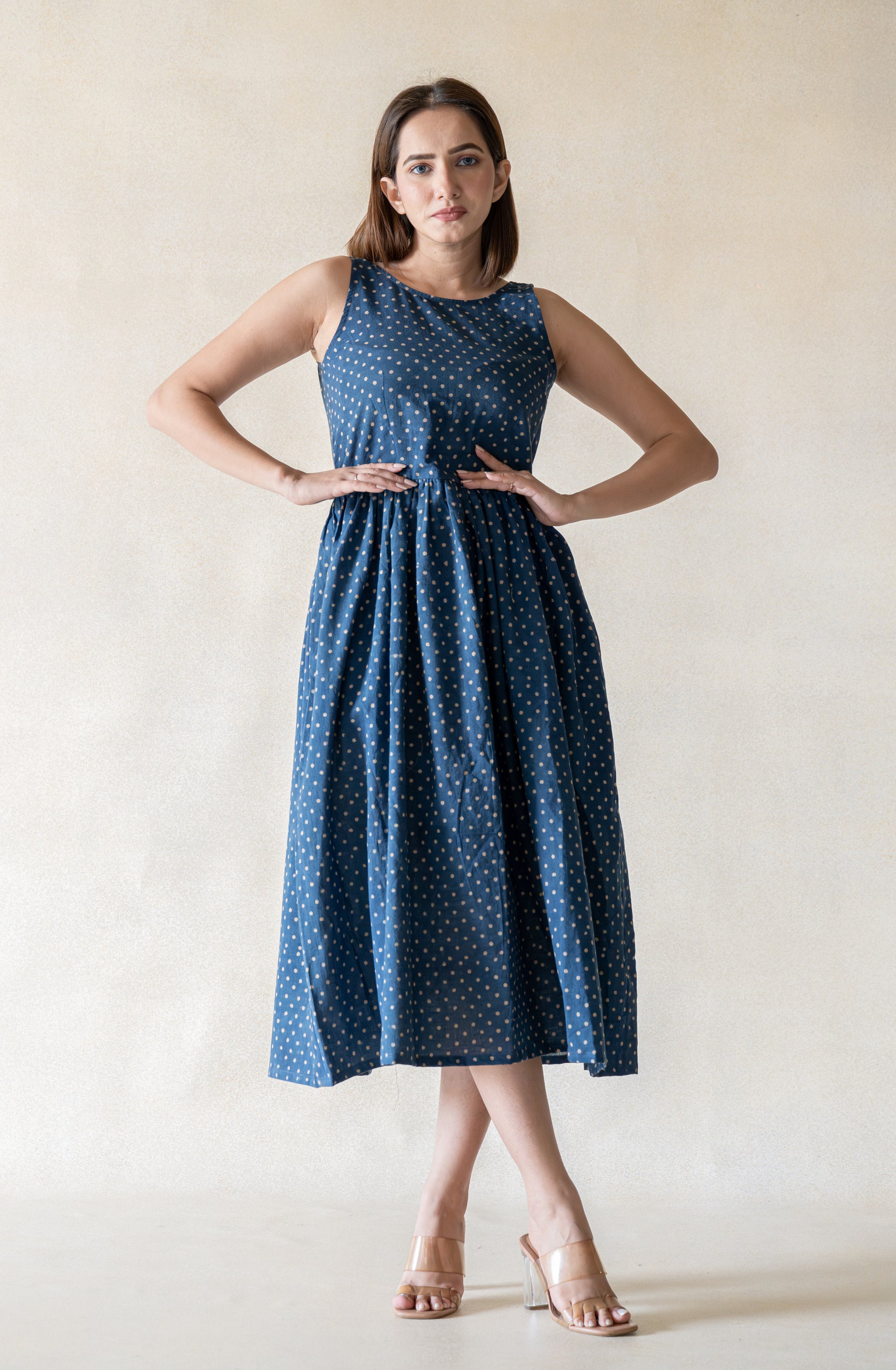 Indigo polka dot cotton dress with a relaxed silhouette and gentle gathers. Easy everyday dress in indigo colour, breathable and lightweight, not lined, designed for comfort and effortless wear.