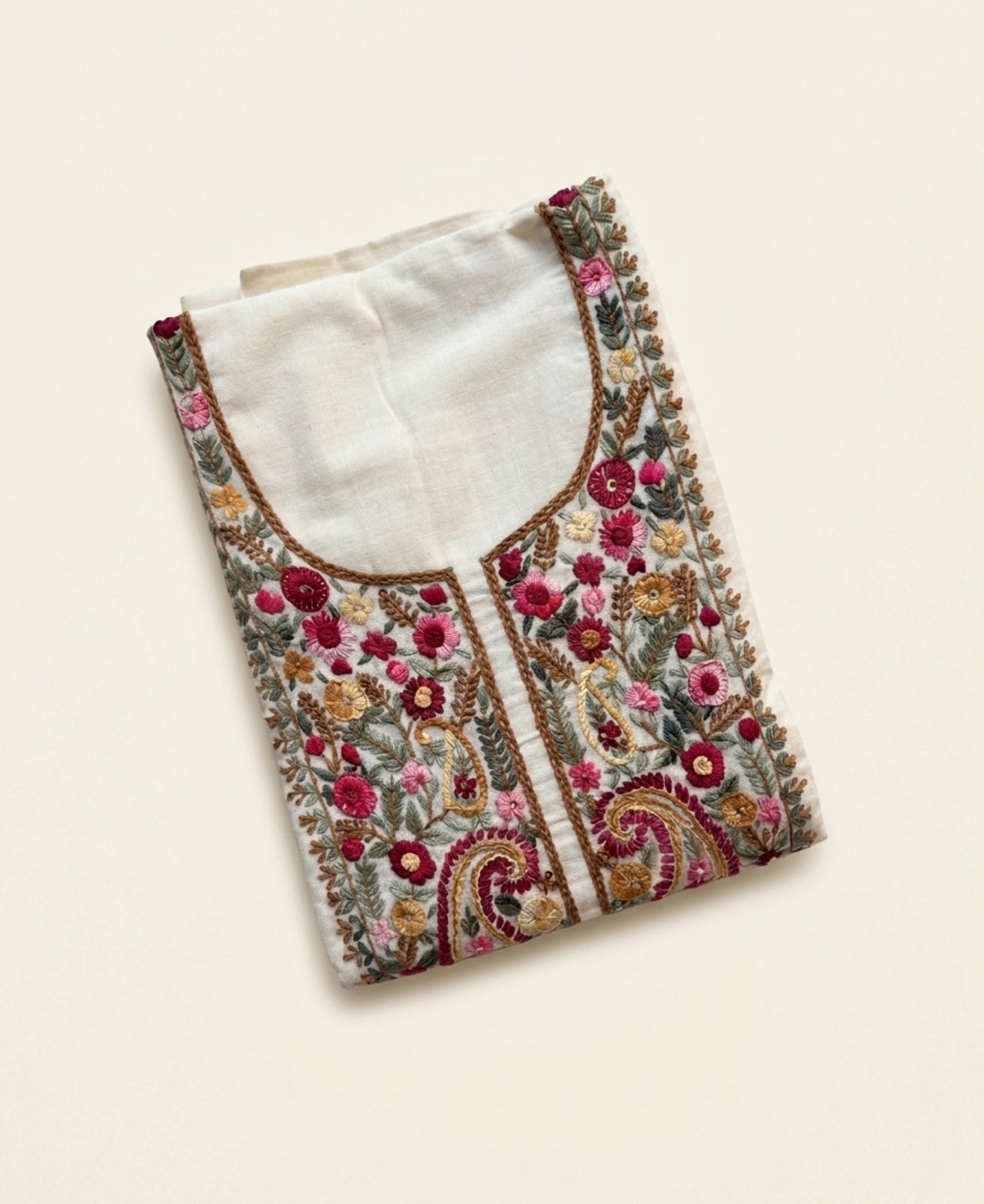 Handspun cotton unstitched kurta featuring a richly hand embroidered paisley and floral yoke in warm pink, mustard, blue, and earthy tones.