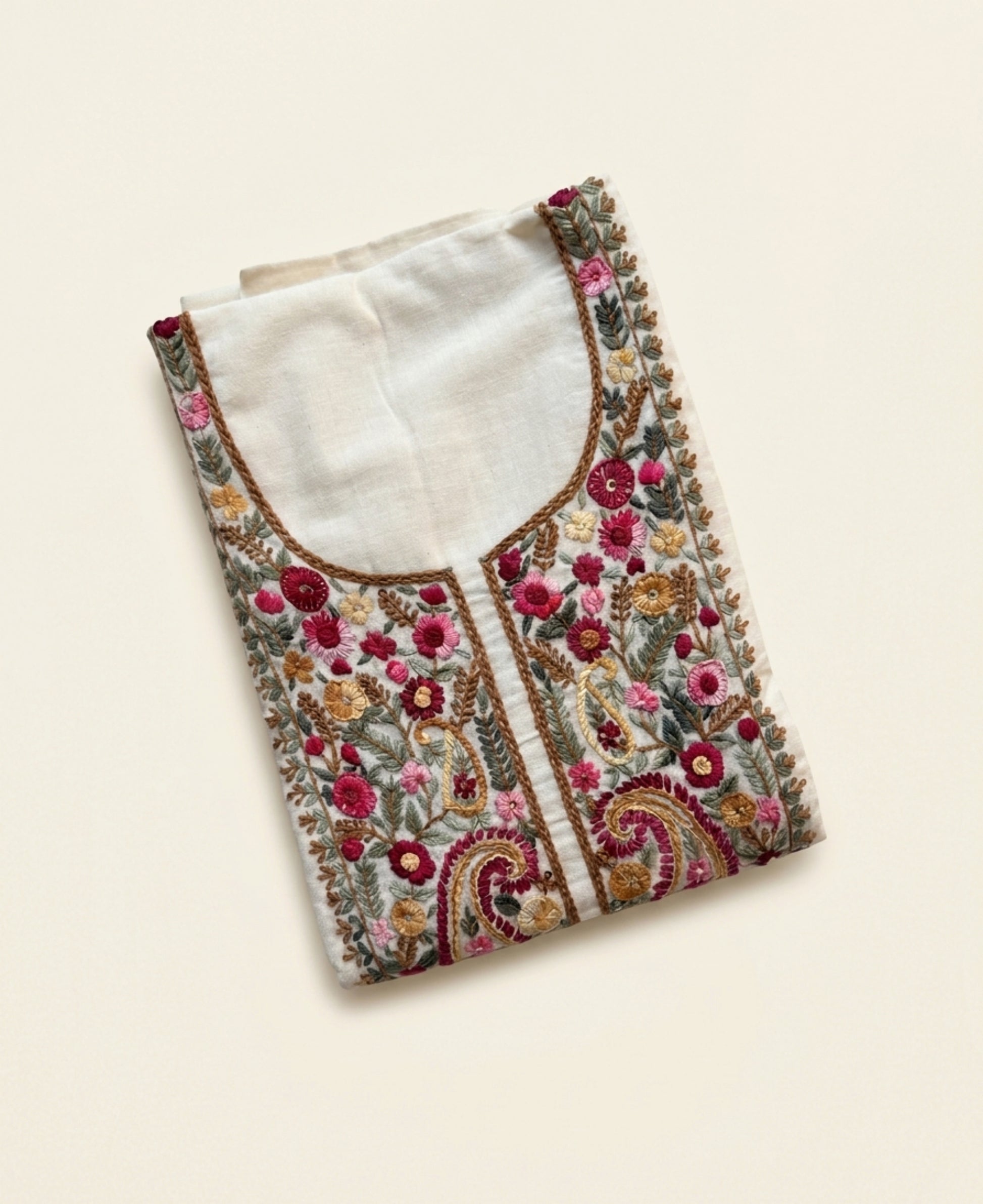 Handspun cotton unstitched kurta featuring a richly hand embroidered paisley and floral yoke in warm pink, mustard, blue, and earthy tones.
