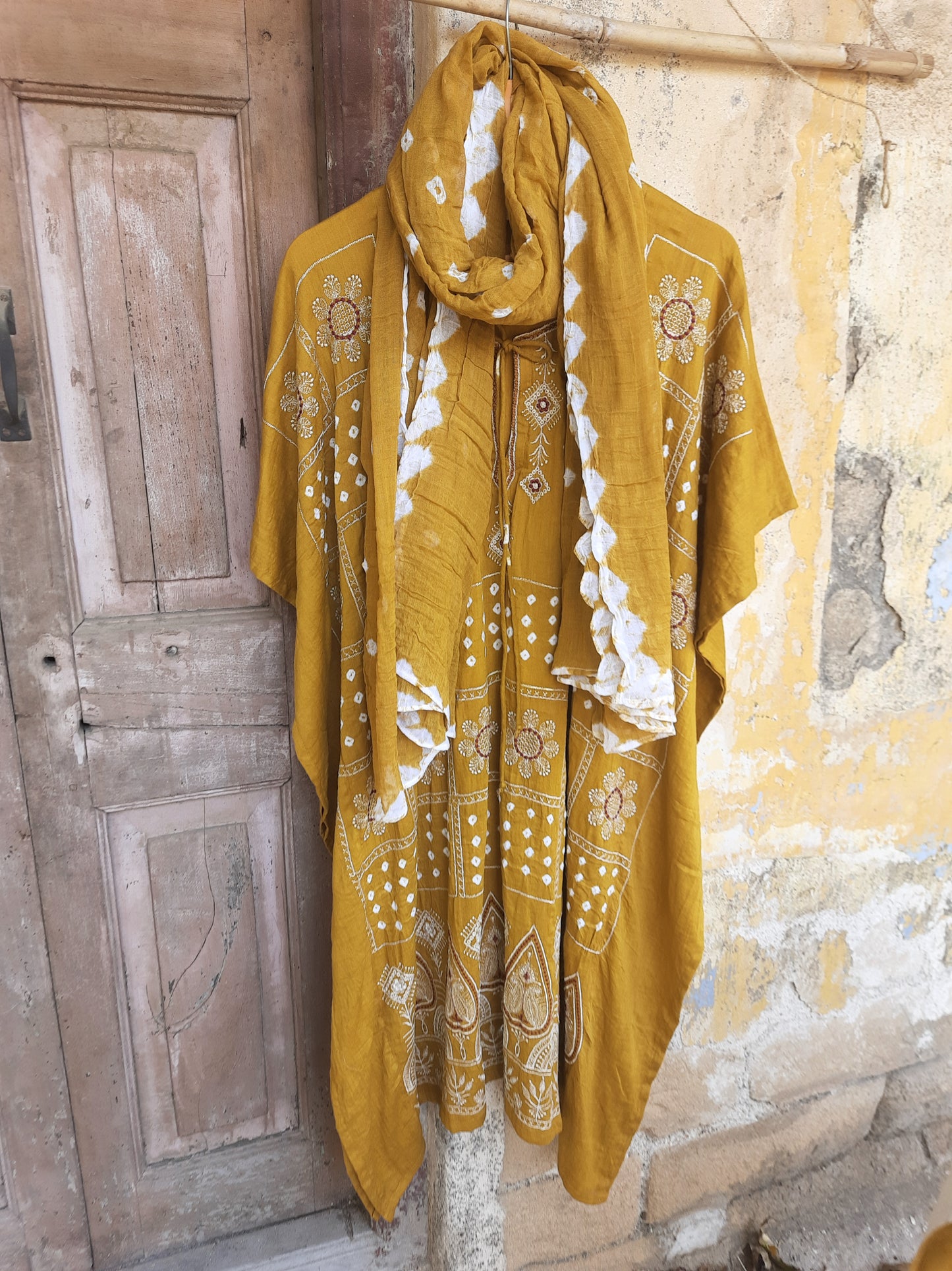 Mustard Bandhani embroidered three-piece set with kaftan, cotton satin pants, and dupatta, handcrafted at Turquoisethestore.