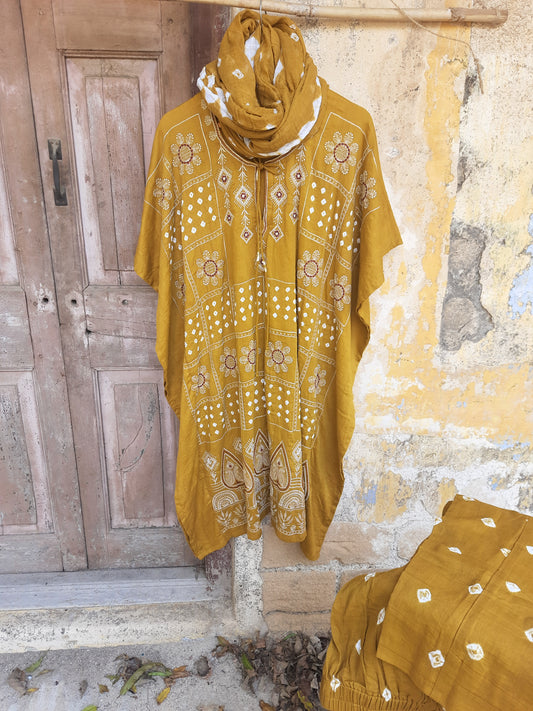 Mustard Bandhani embroidered three-piece set with kaftan, cotton satin pants, and dupatta, handcrafted at Turquoisethestore.