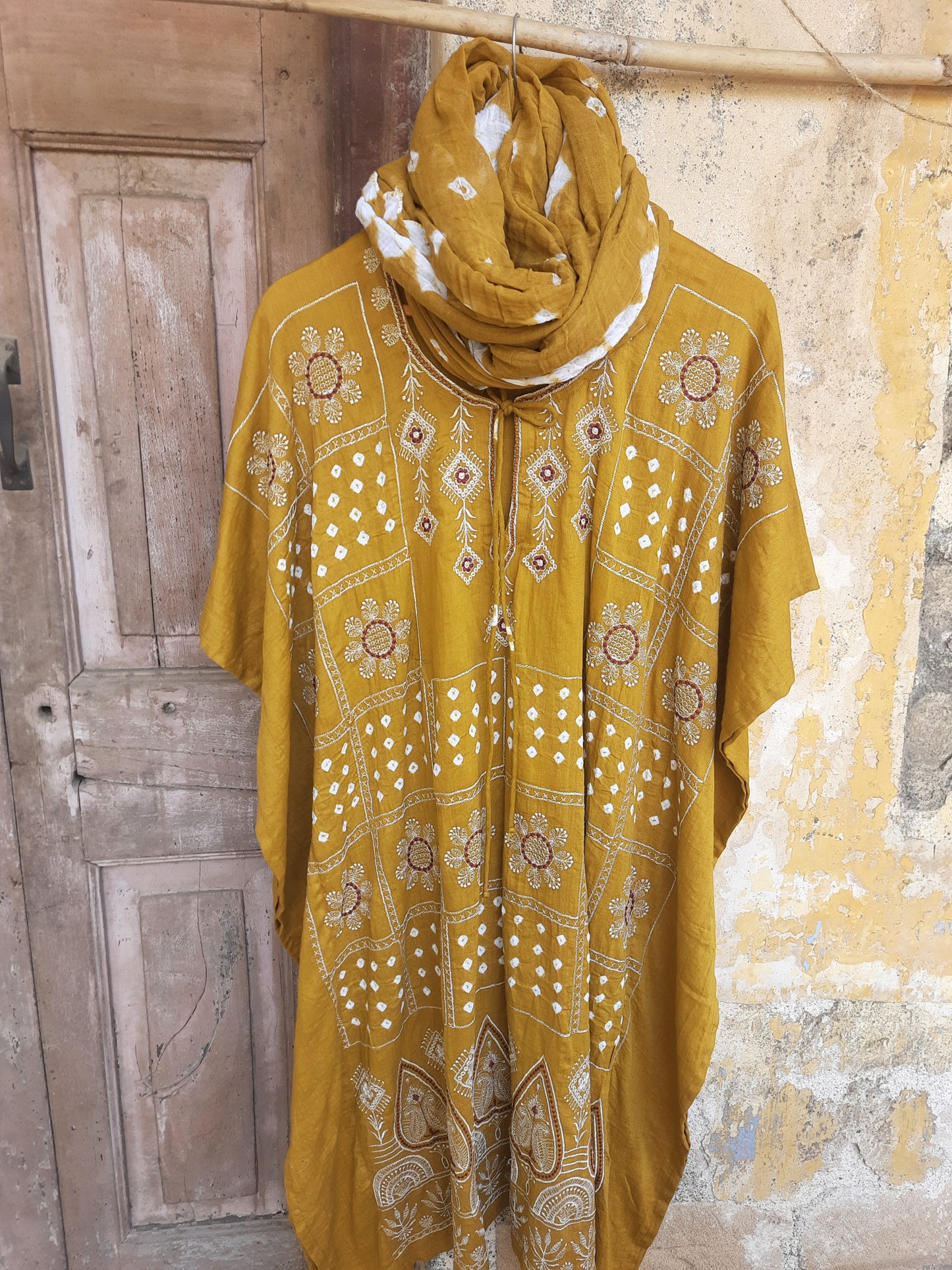 Mustard Bandhani embroidered three-piece set with kaftan, cotton satin pants, and dupatta, handcrafted at Turquoisethestore.