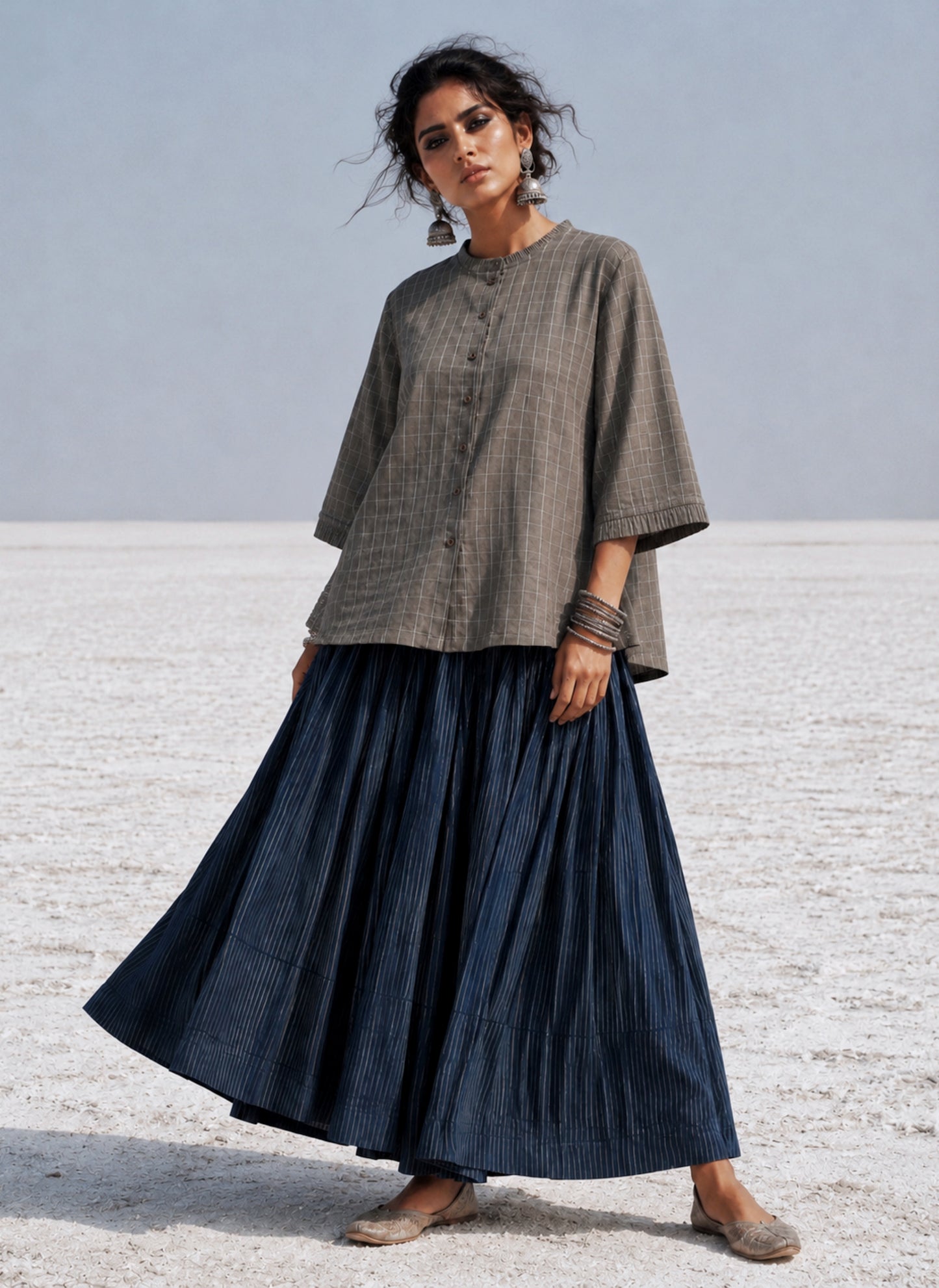 Stone grey hand spun handwoven cotton checks shirt with pleated neckline, pleated sleeve hems and relaxed fit