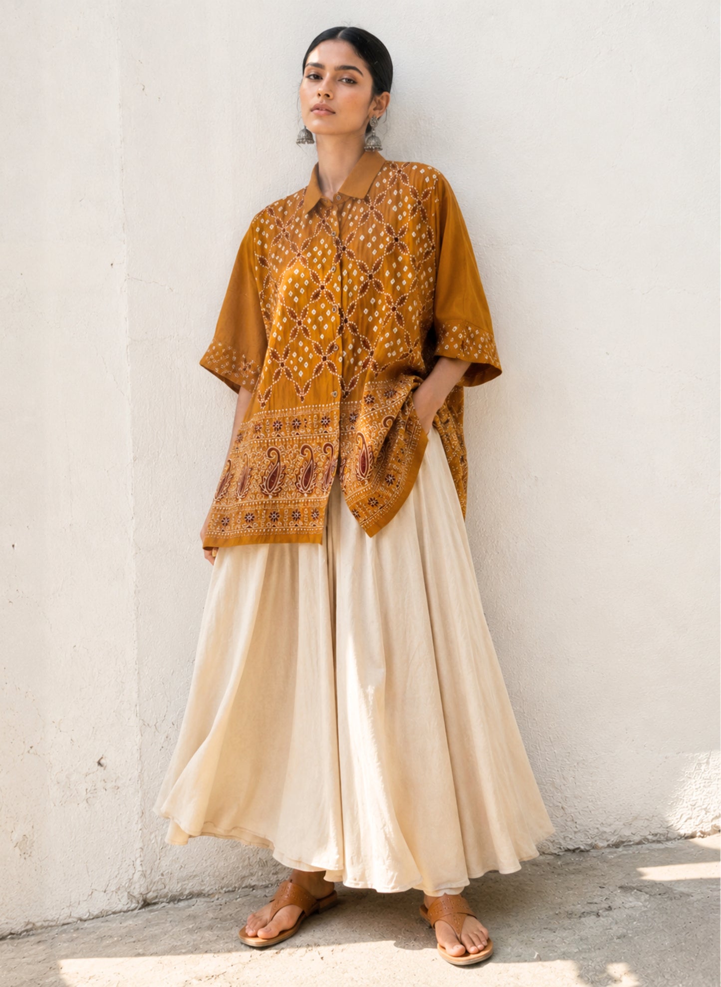 Ambadi Dani mustard Bandhani embroidered cotton satin relaxed fit collared shirt for women