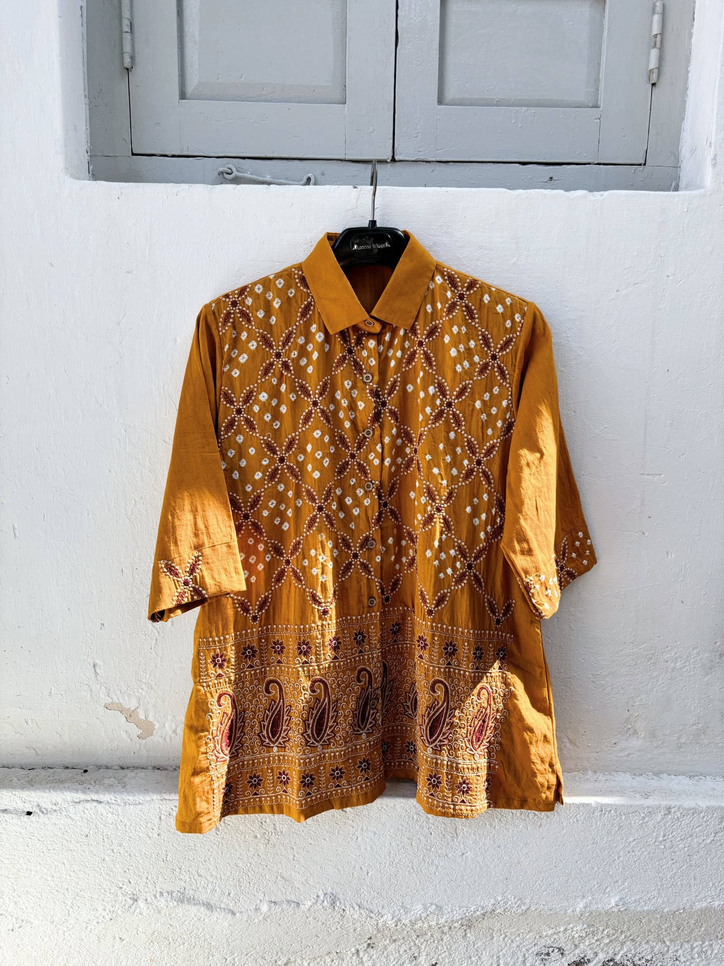 Ambadi Dani mustard Bandhani embroidered cotton satin relaxed fit collared shirt for women