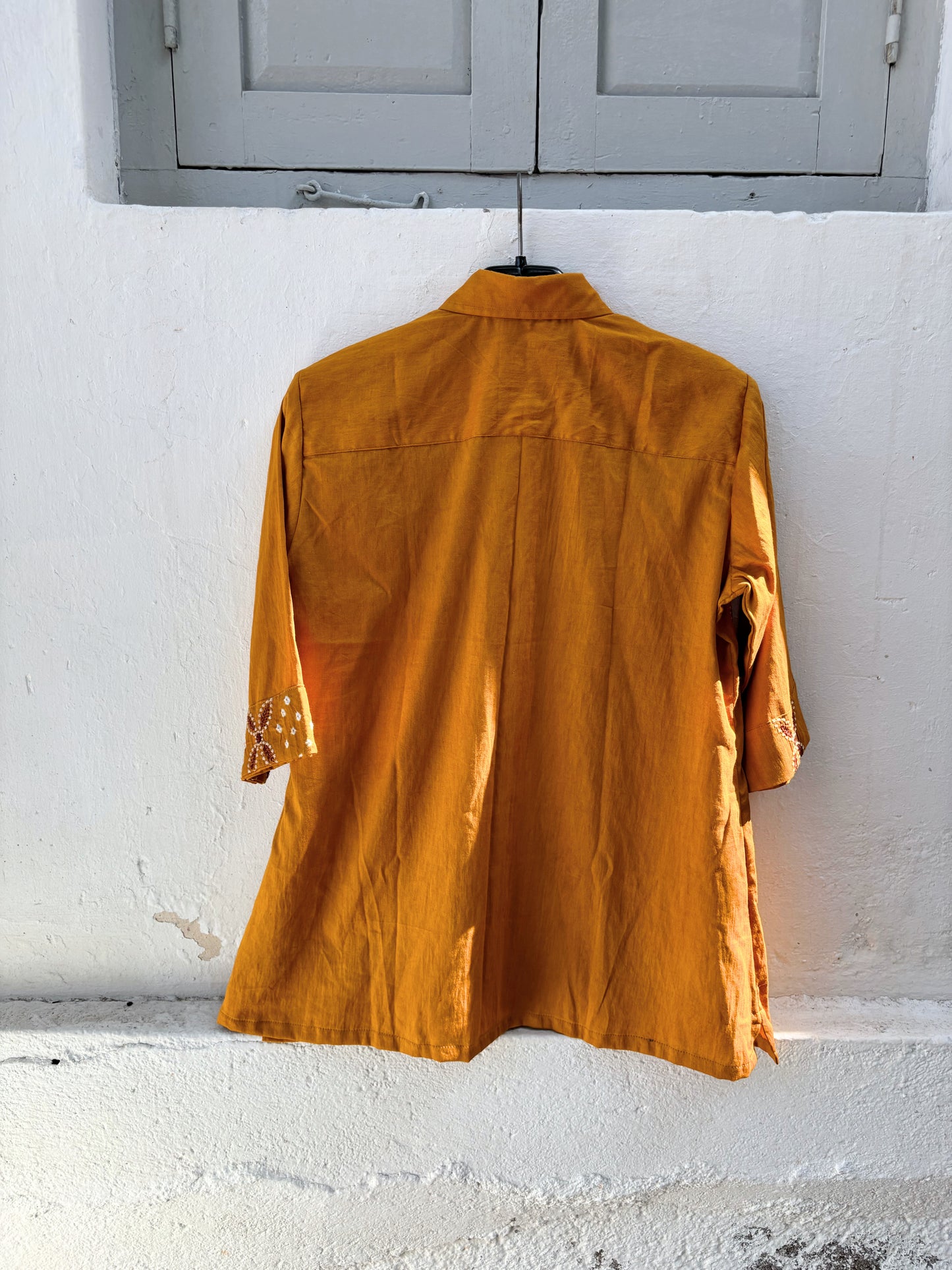 Ambadi Dani mustard Bandhani embroidered cotton satin relaxed fit collared shirt for women