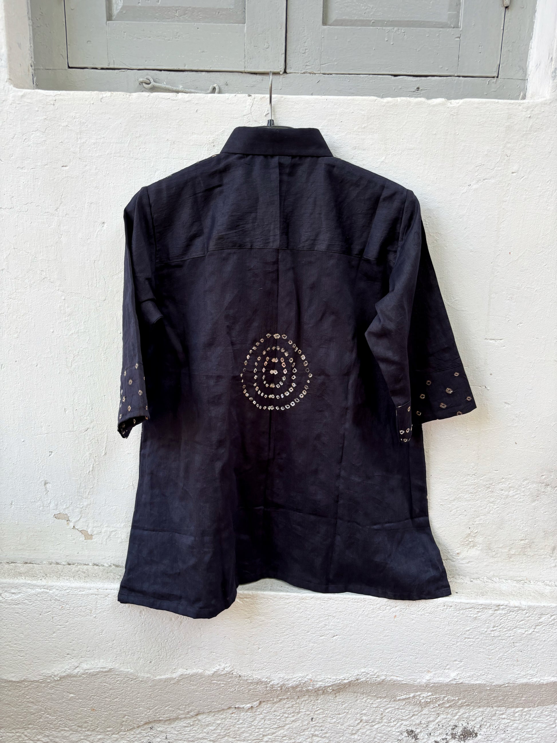Black Bandhani shirt for women with hand tie dyed ivory patterns in cotton satin, relaxed fit and classic collar design
