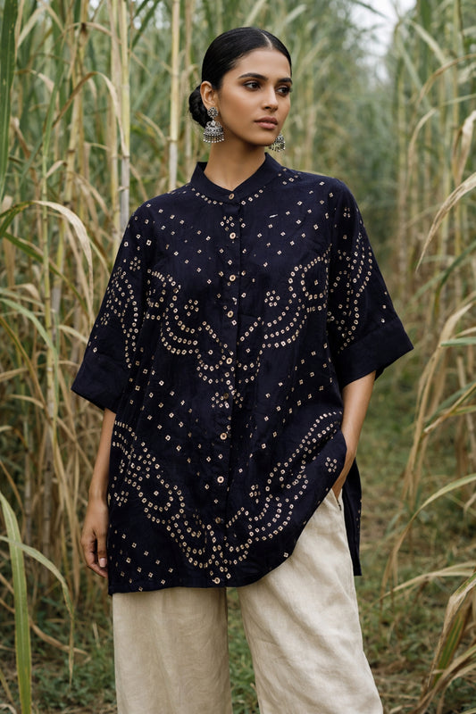 Black Bandhani shirt for women with mandarin collar and cuff sleeves, hand tie dyed ivory patterns on cotton satin, relaxed fit.