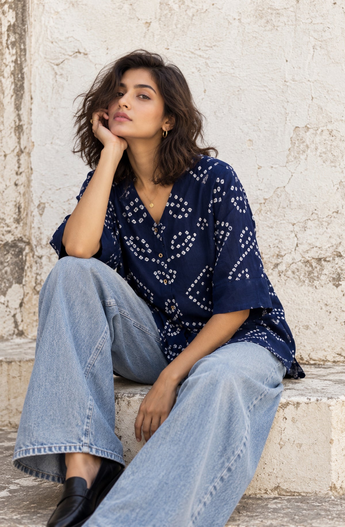 Blue Hour deep ink-blue cotton satin shirt with ivory hand tie-dyed Bandhani motifs, V-neckline and plain sleeve cuffs.