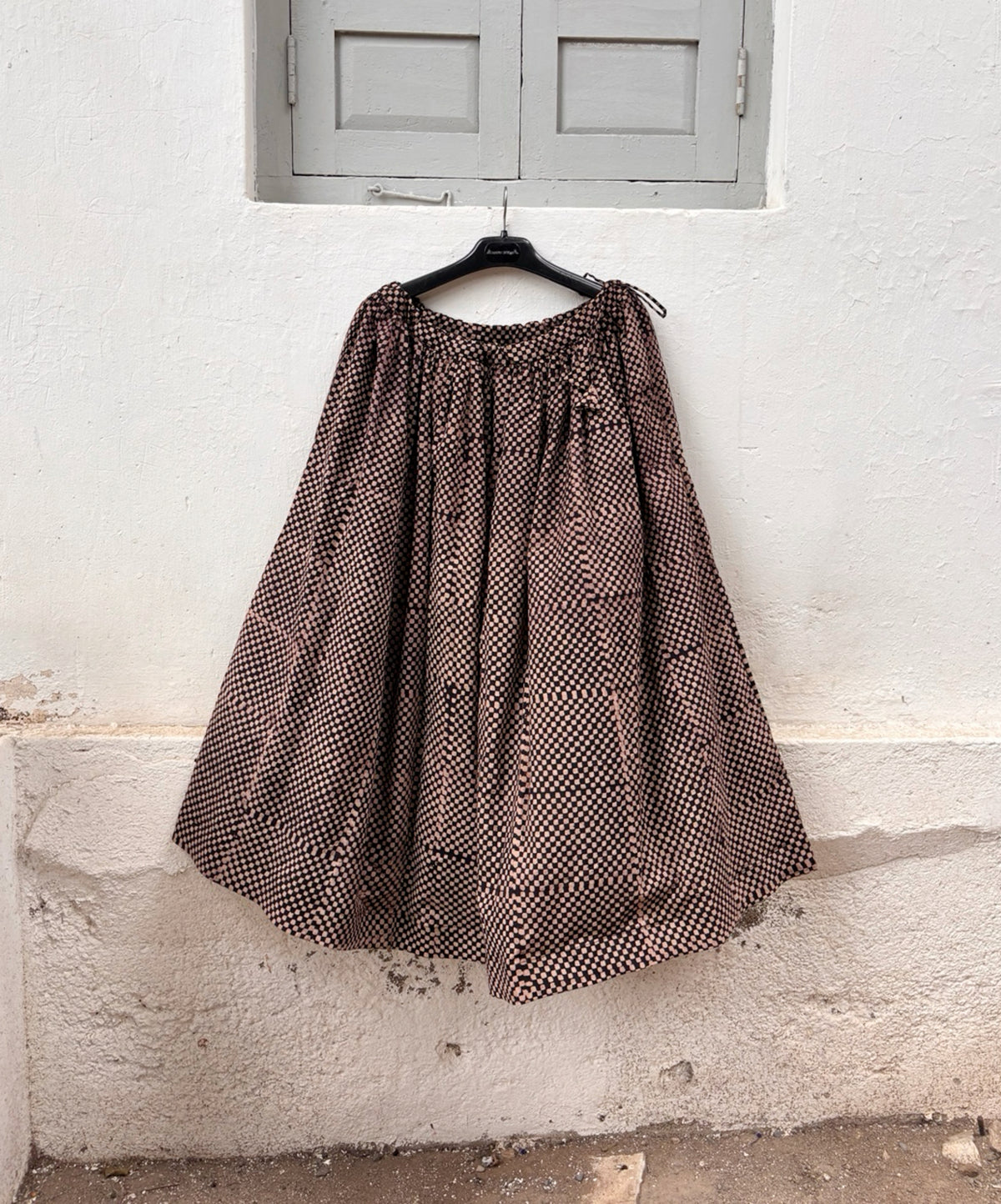 Chaukadi charcoal black and beige checkered Ajrakh cotton skirt with hand block printed natural dye pattern