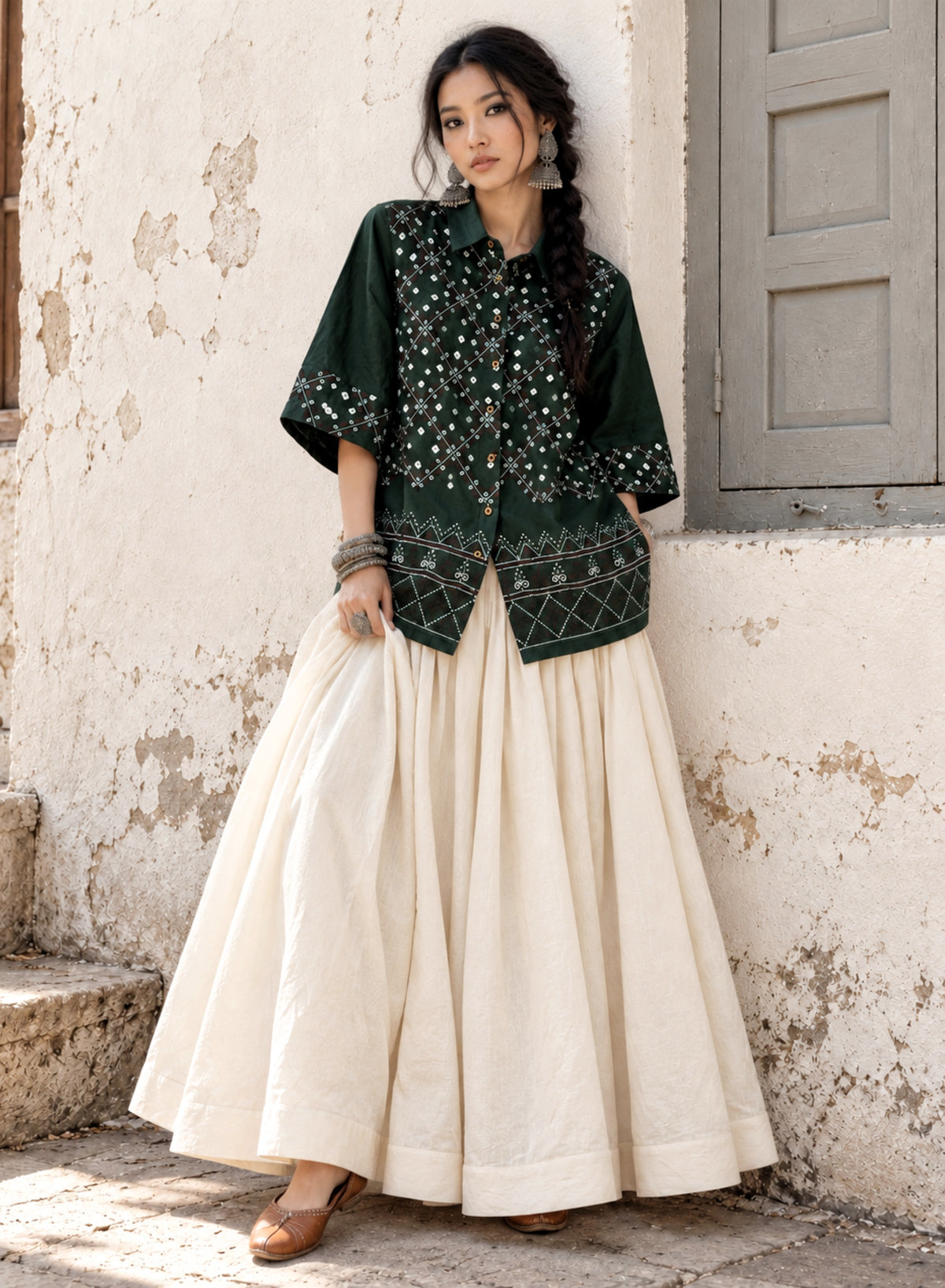 Dhani deep olive green hand tie-dyed Bandhani cotton satin shirt with ivory dots, geometric machine embroidery and embroidered borders.