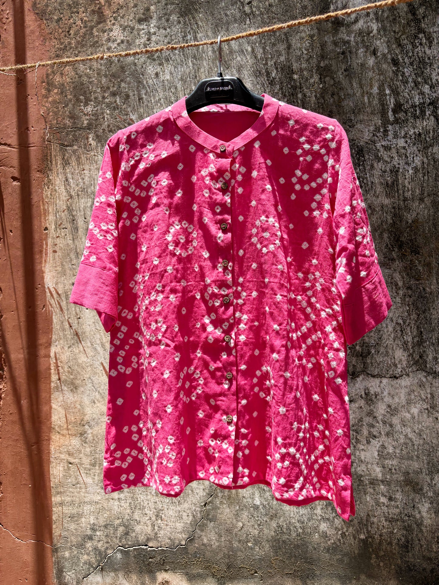 Pink Bandhani shirt for women with structured front pattern and round design at back, hand tie dyed on cotton satin