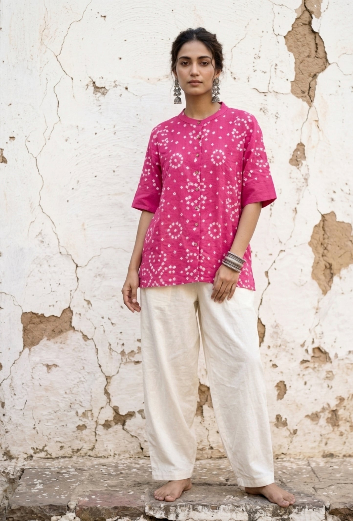Pink Bandhani shirt for women with structured front pattern and round design at back, hand tie dyed on cotton satin
