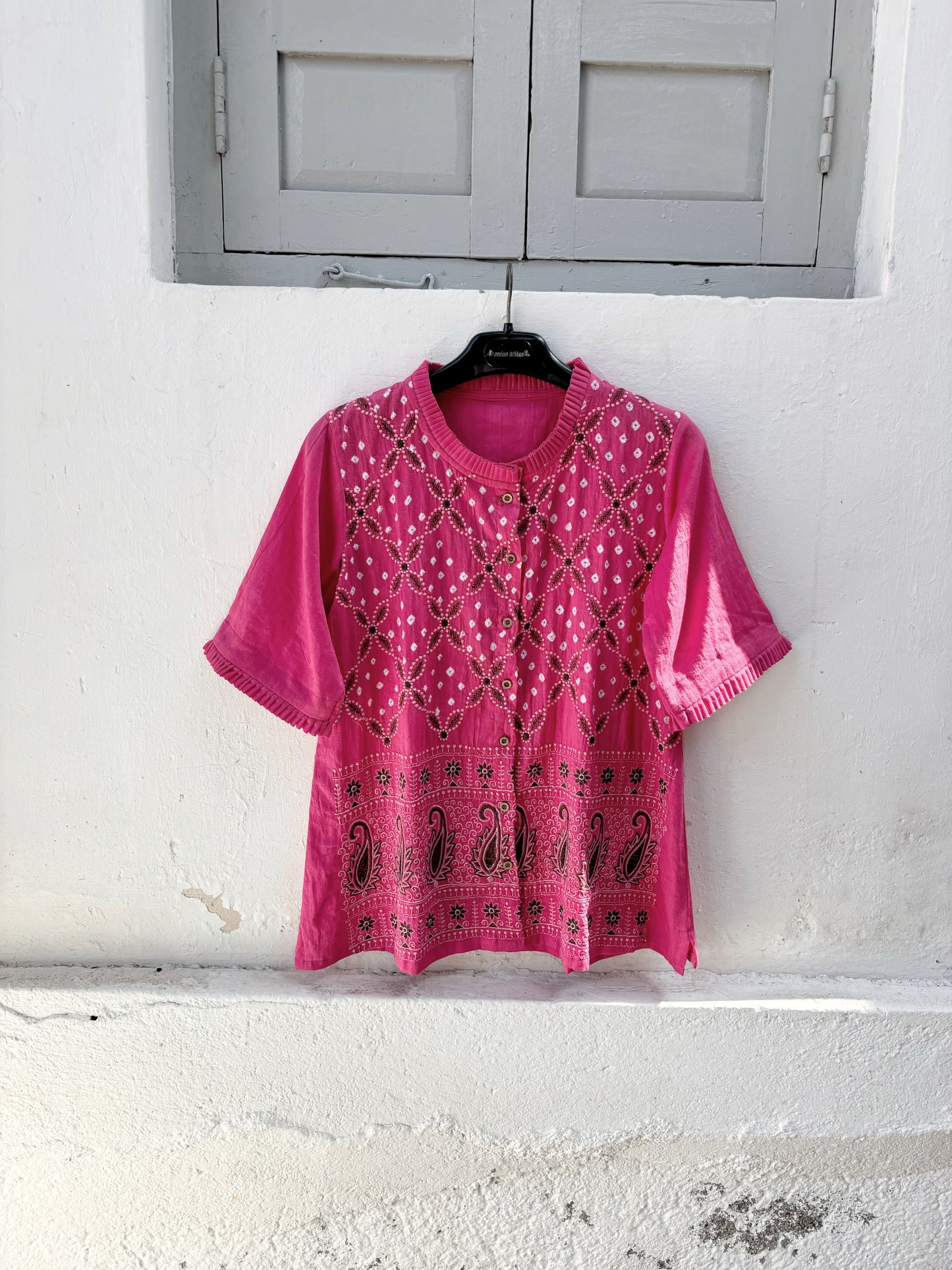 Gulaabi Dani pink Bandhani embroidered cotton satin relaxed fit shirt with pleated neckline for women