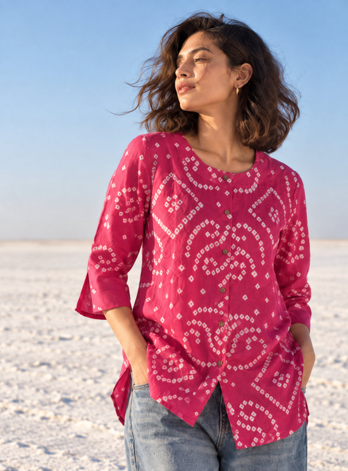 Subtle gulabi pink cotton shirt with hand tie-dyed ivory Bandhani circular motifs, round neckline and 3/4 sleeves.