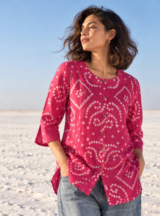 Subtle gulabi pink cotton shirt with hand tie-dyed ivory Bandhani circular motifs, round neckline and 3/4 sleeves.