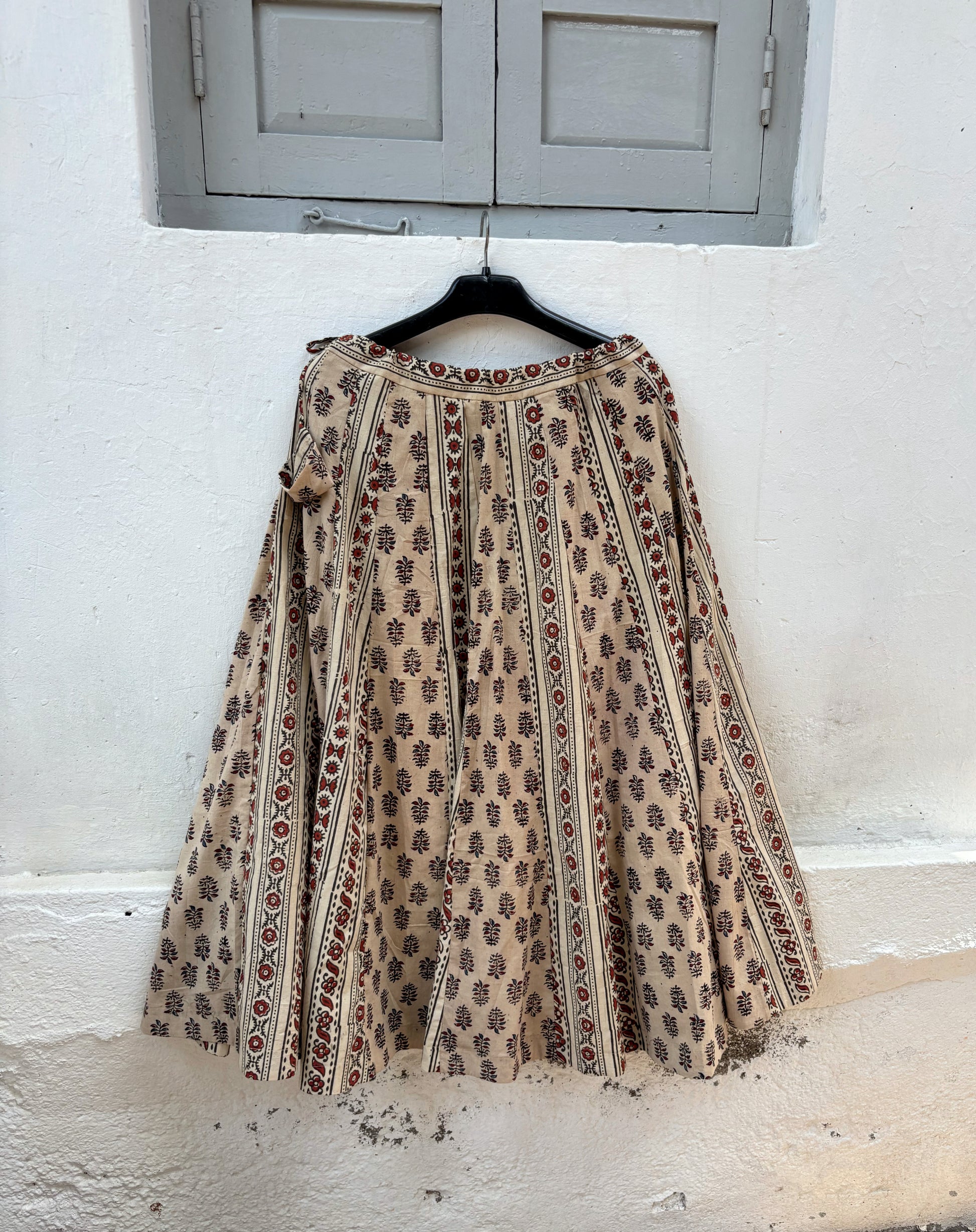 Gulika hand block printed Ajrakh cotton kali skirt with floral and geometric motifs
