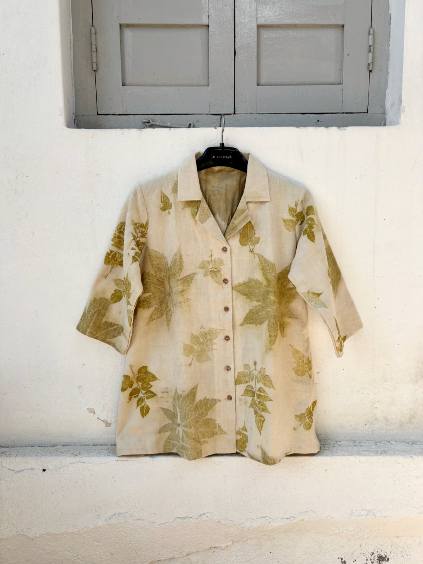 Handspun handwoven cotton eco print shirt for women in sand beige with natural leaf prints in olive tones, relaxed fit, handmade and naturally dyed.