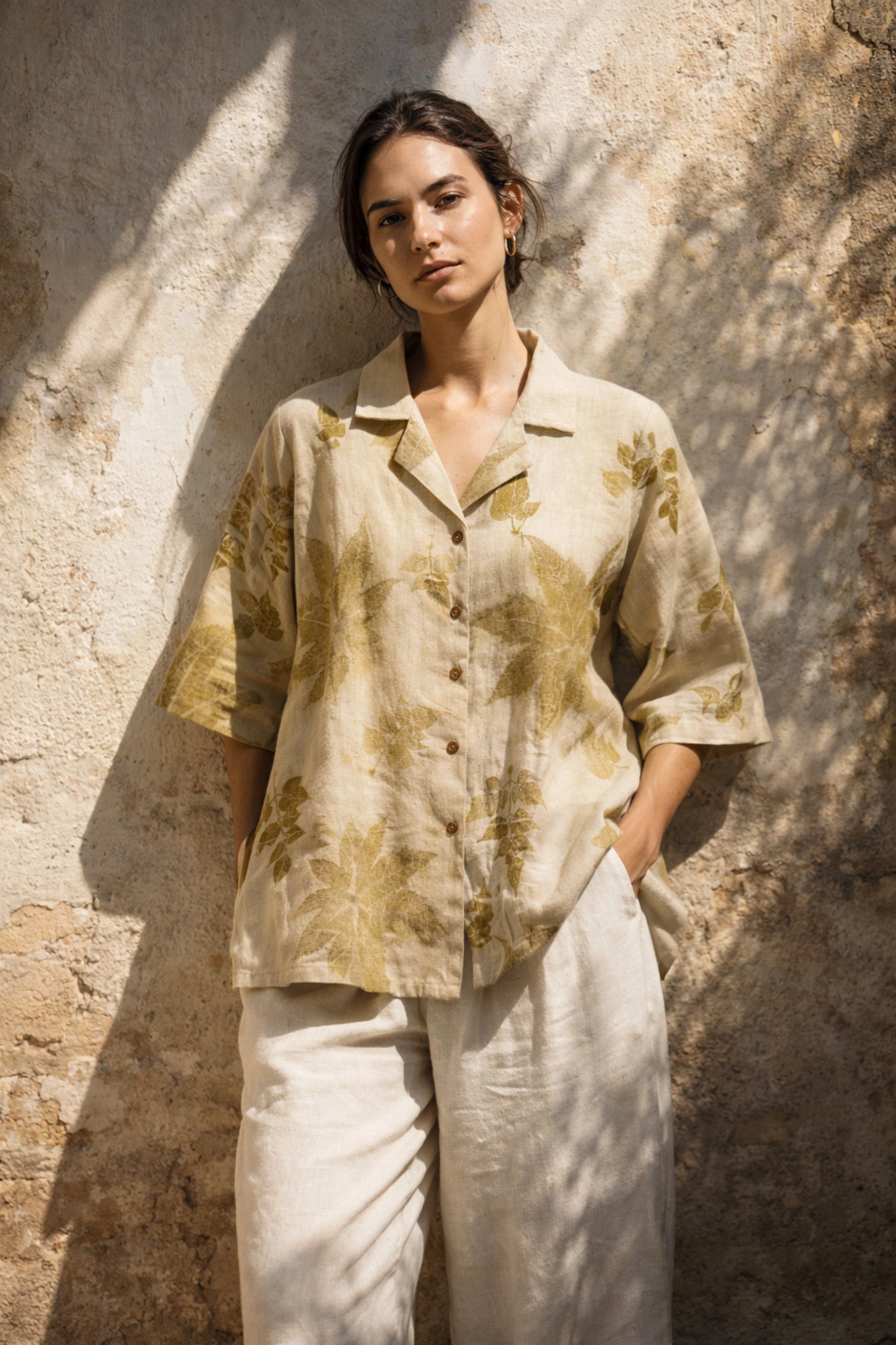 Handspun handwoven cotton eco print shirt for women in sand beige with natural leaf prints in olive tones, relaxed fit, handmade and naturally dyed.