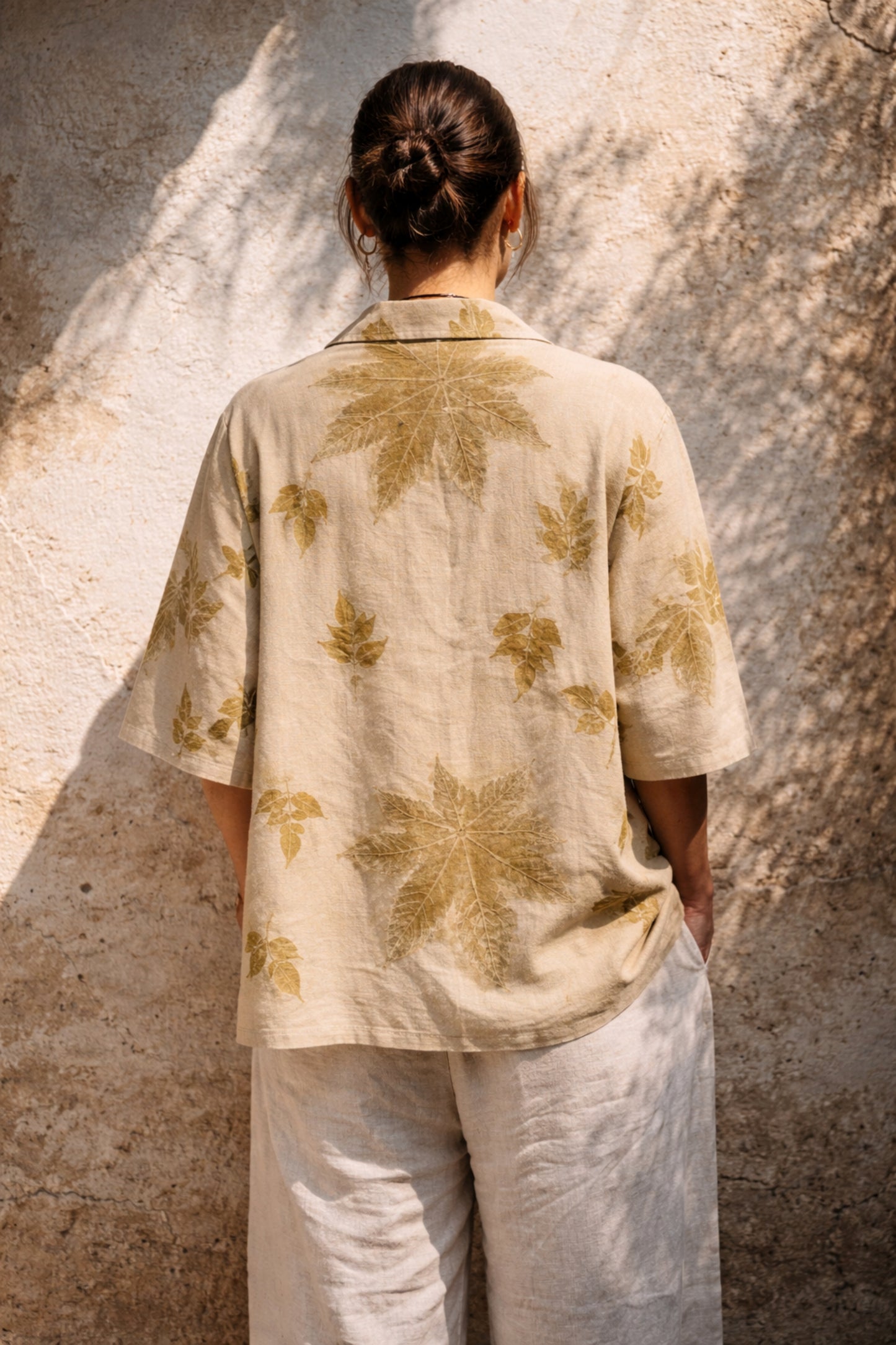 Handspun handwoven cotton eco print shirt for women in sand beige with natural leaf prints in olive tones, relaxed fit, handmade and naturally dyed.