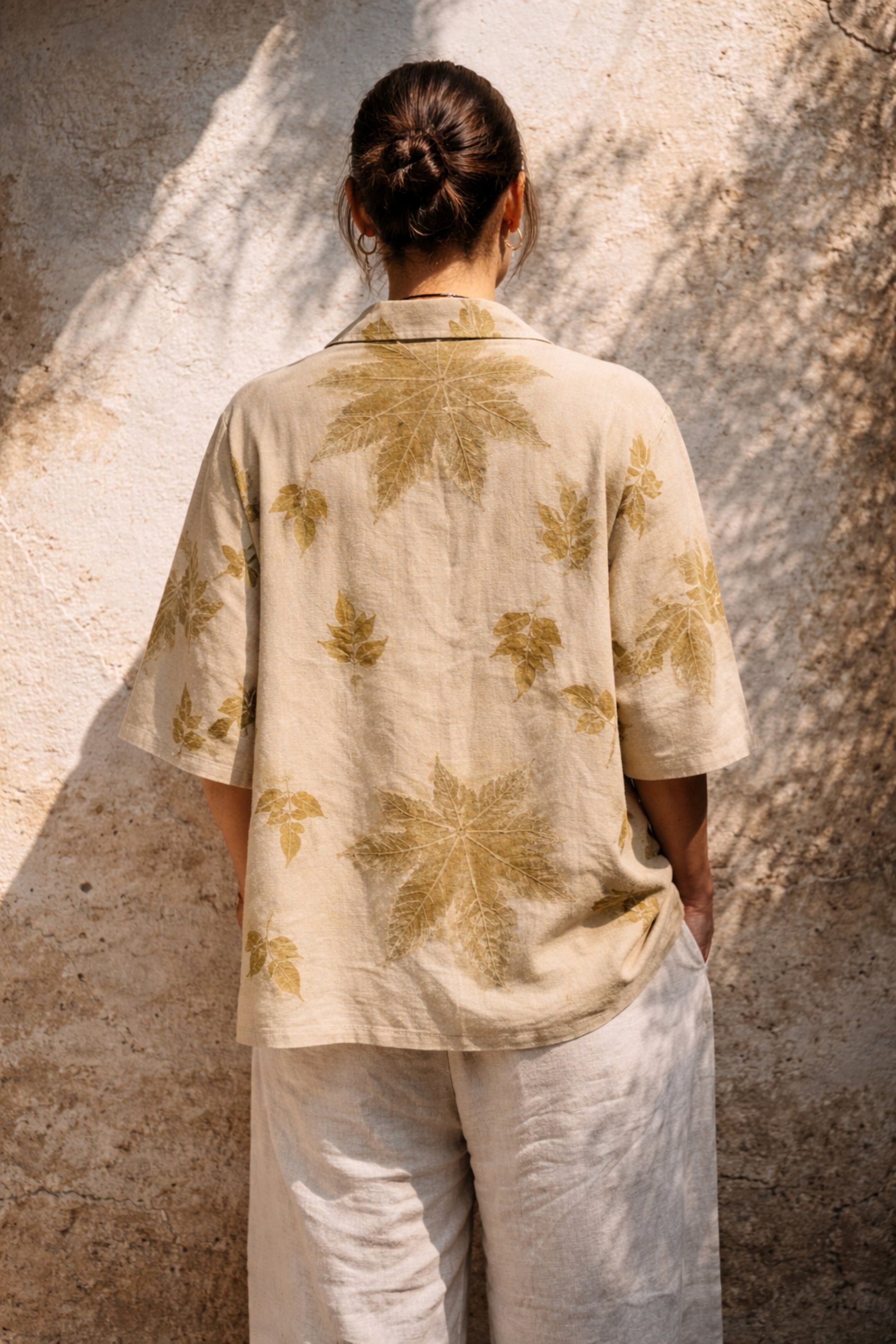 Handspun handwoven cotton eco print shirt for women in sand beige with natural leaf prints in olive tones, relaxed fit, handmade and naturally dyed.