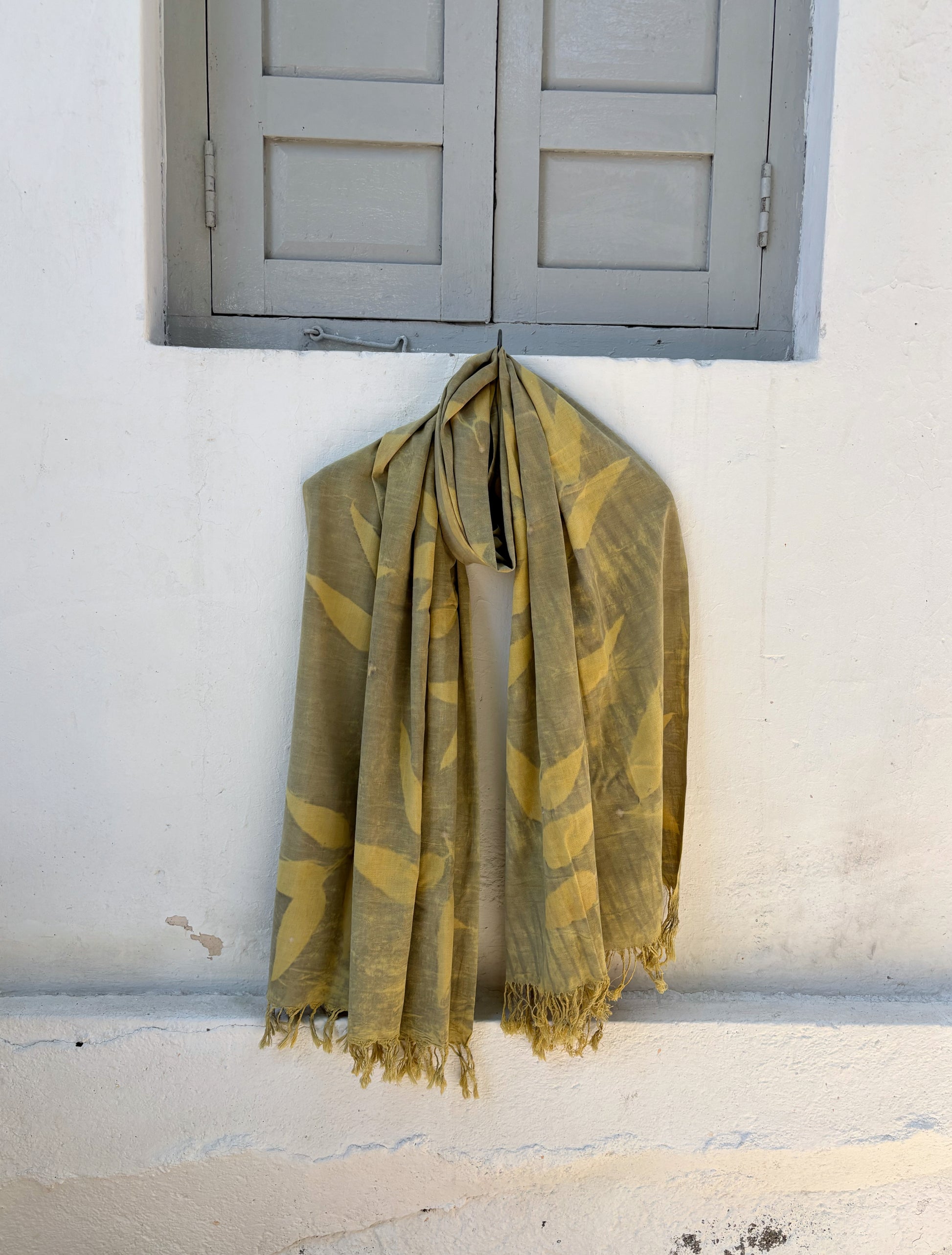 Naturally dyed eco printed handspun and handwoven cotton dupatta with botanical leaf prints and tassels