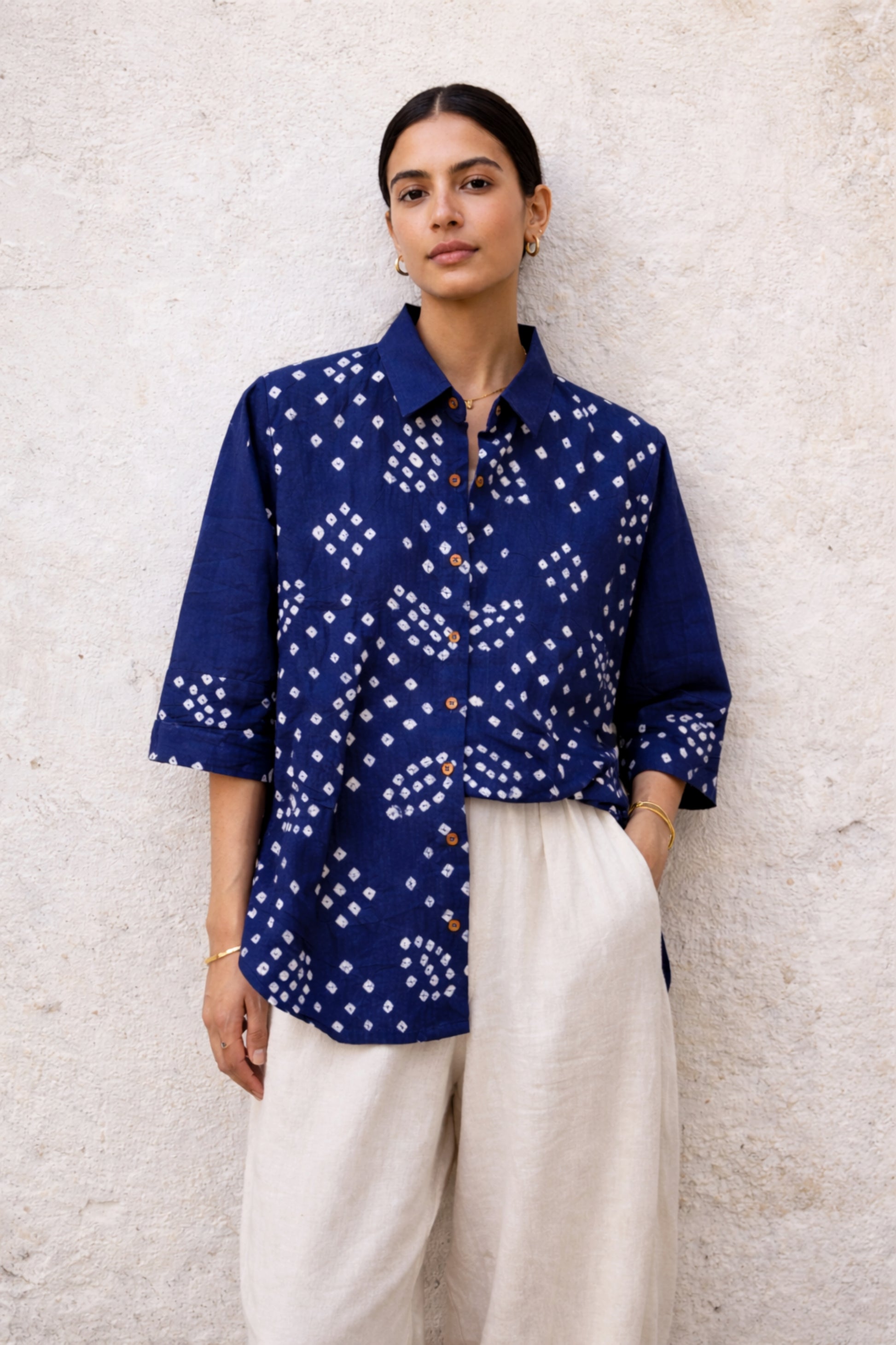 Indigo Bandhani shirt for women in cotton satin with hand tie dyed white dot patterns, relaxed fit and handcrafted design