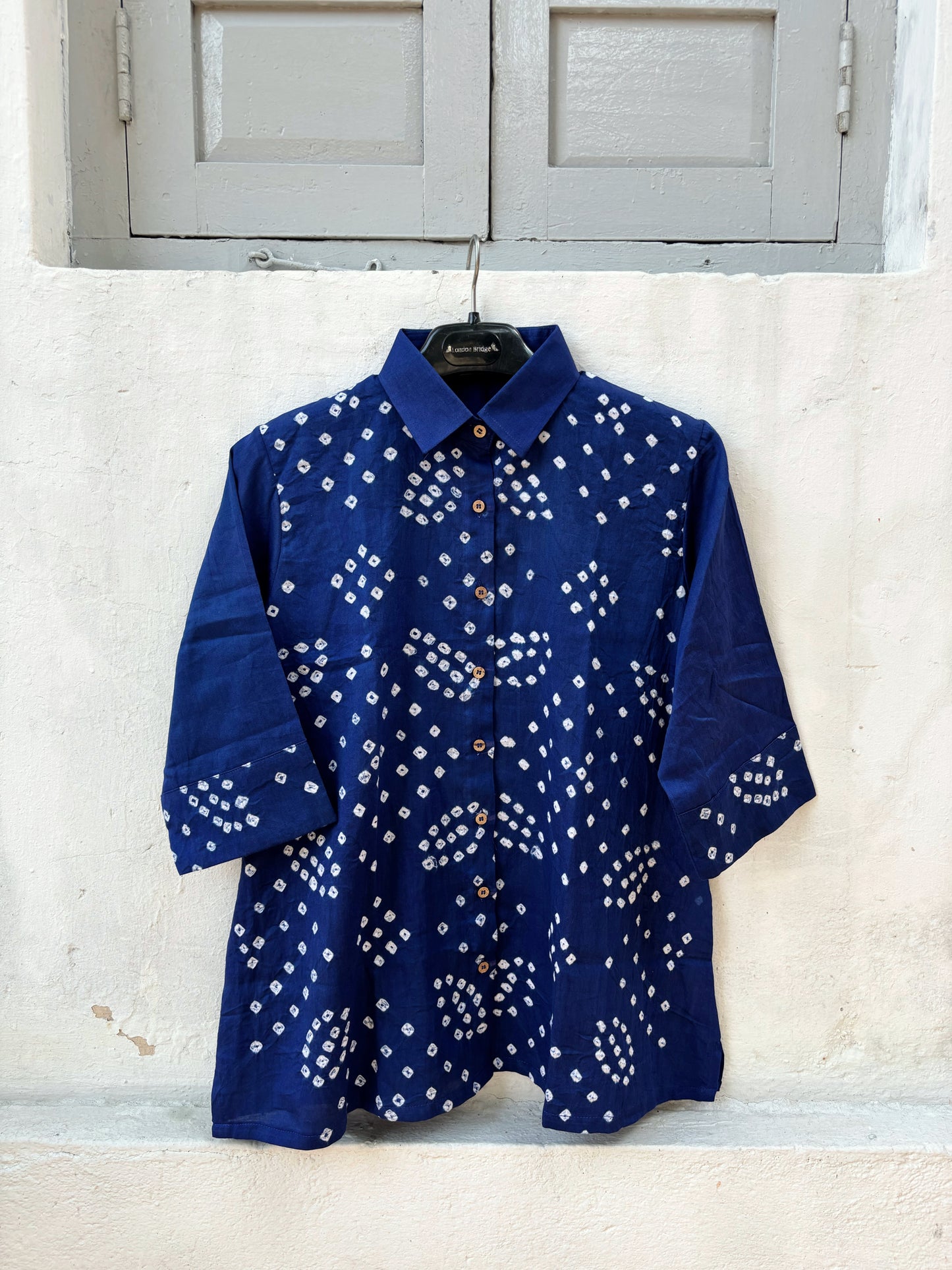 Indigo Bandhani shirt for women in cotton satin with hand tie dyed white dot patterns, relaxed fit and handcrafted design