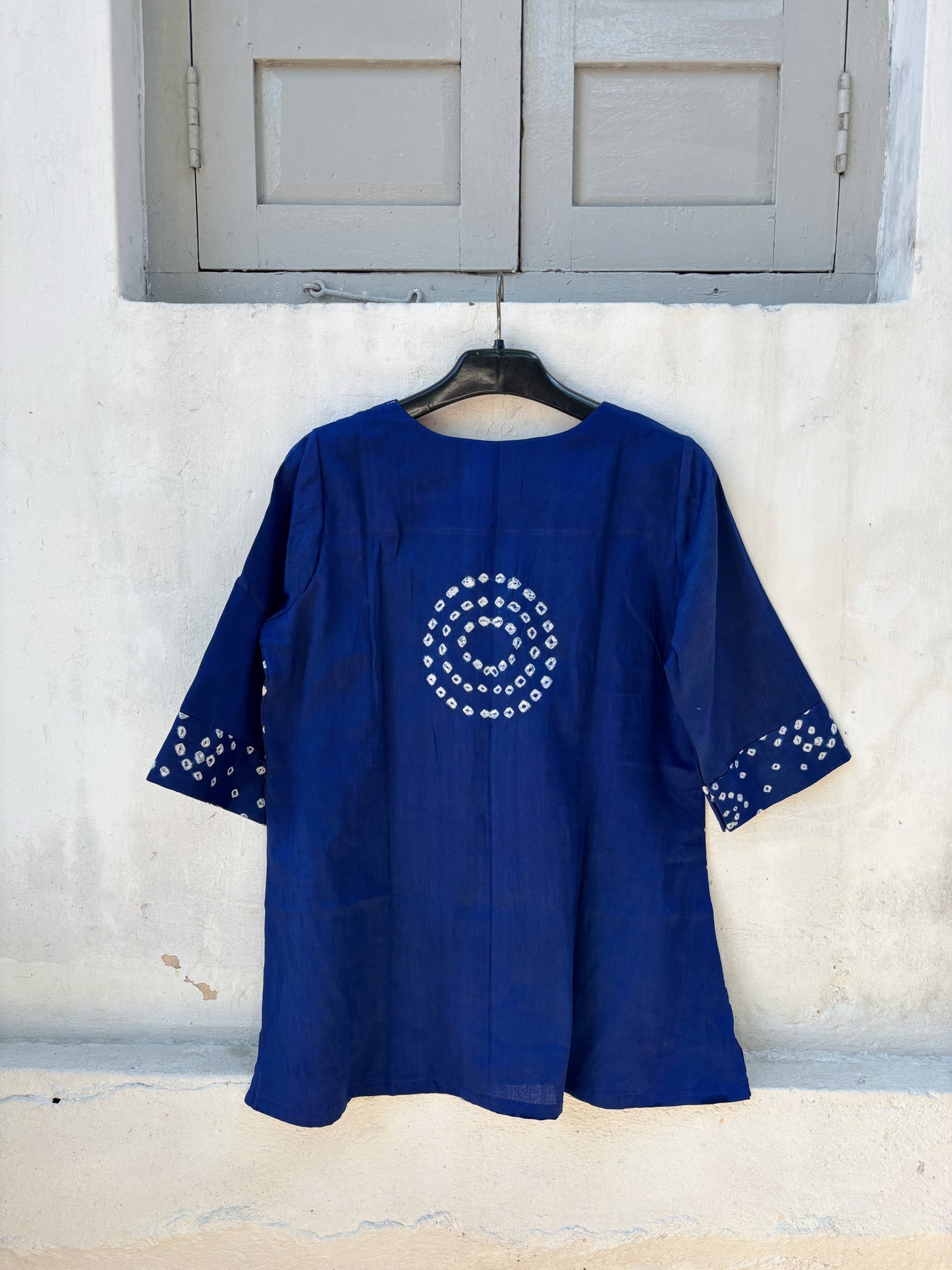 Indigo Bandhani top for women with hand tie dyed white geometric patterns on cotton satin, relaxed fit and V-neck design