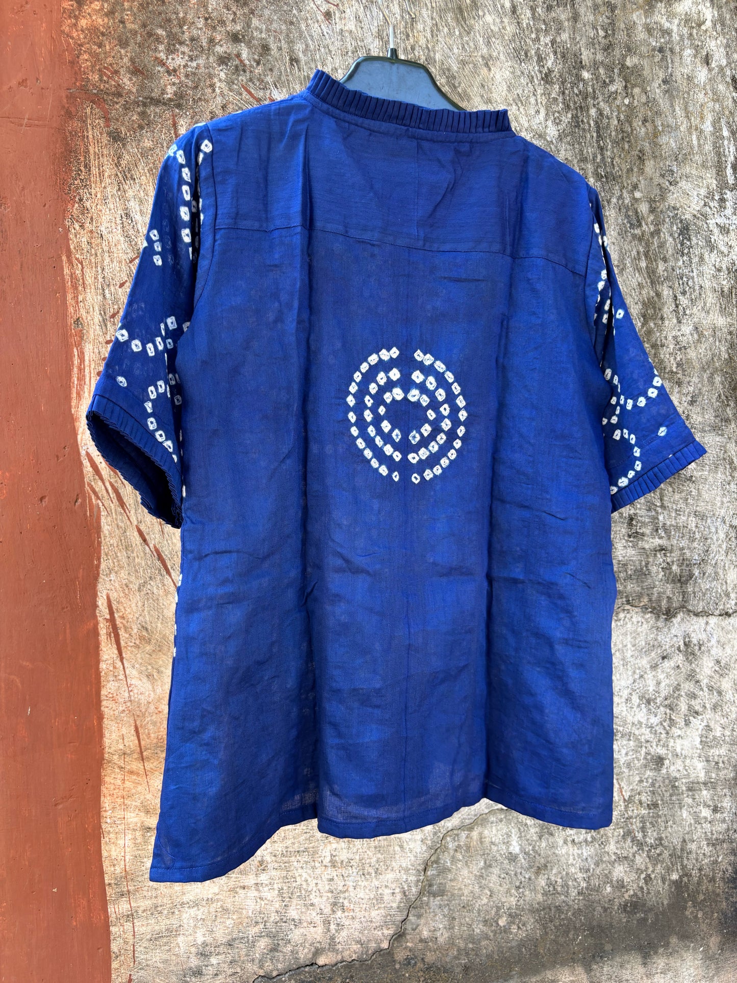 Indigo Bandhani shirt for women with pleated neckline and sleeve hems, hand tie dyed white patterns on cotton satin, relaxed fit
